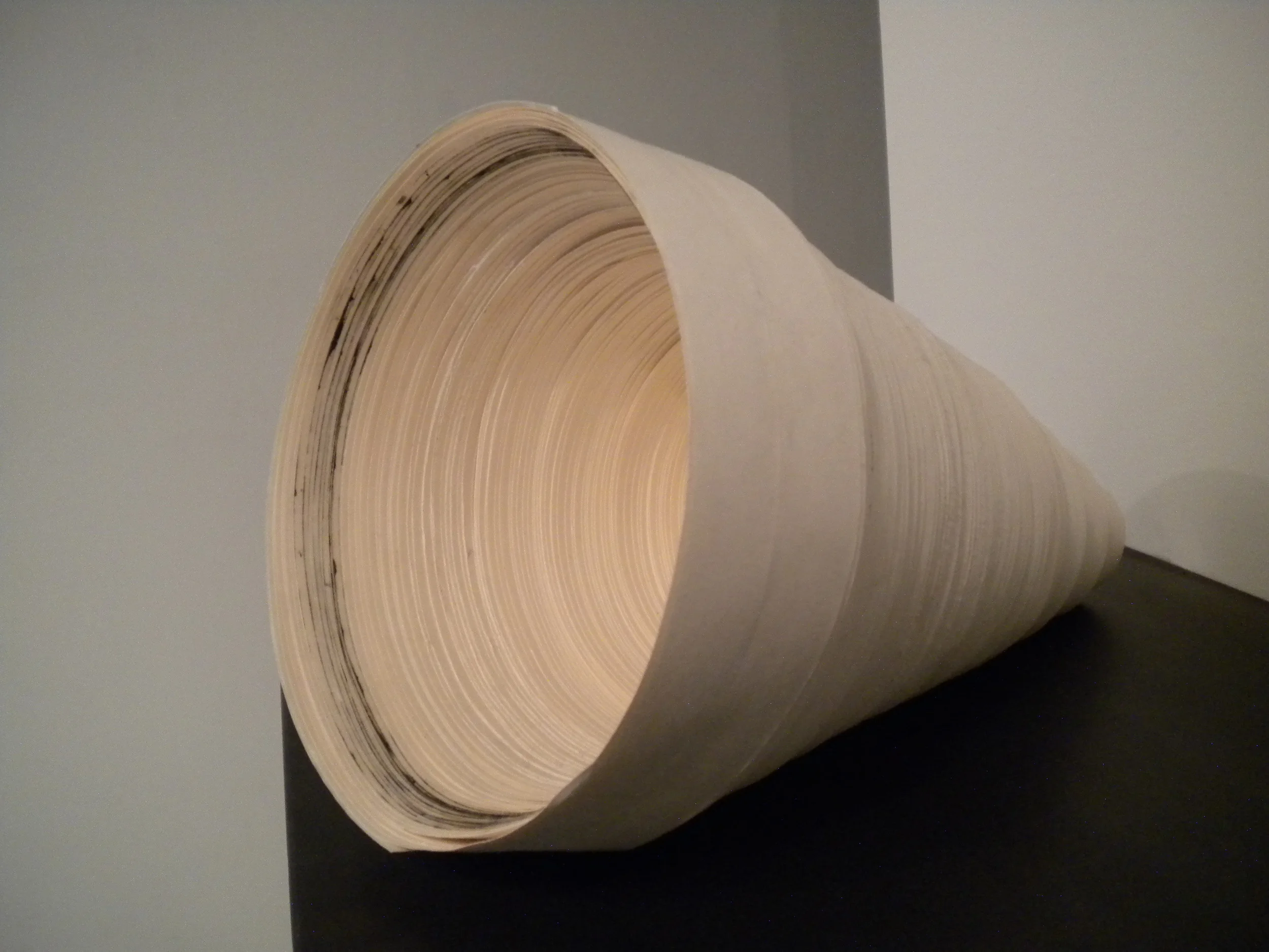   Conch.   16”x 11”.  Salvaged drywall tape. 