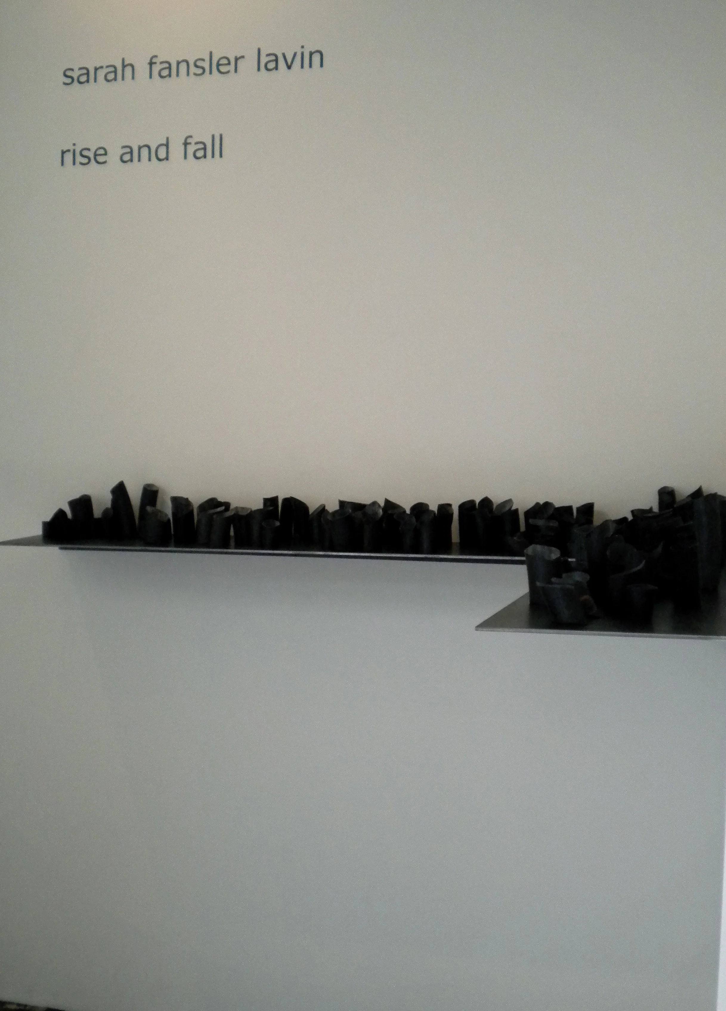   low waters.   4’x 4’x 8”.  Salvaged bike inner tubes from artist. Steel shelf. 