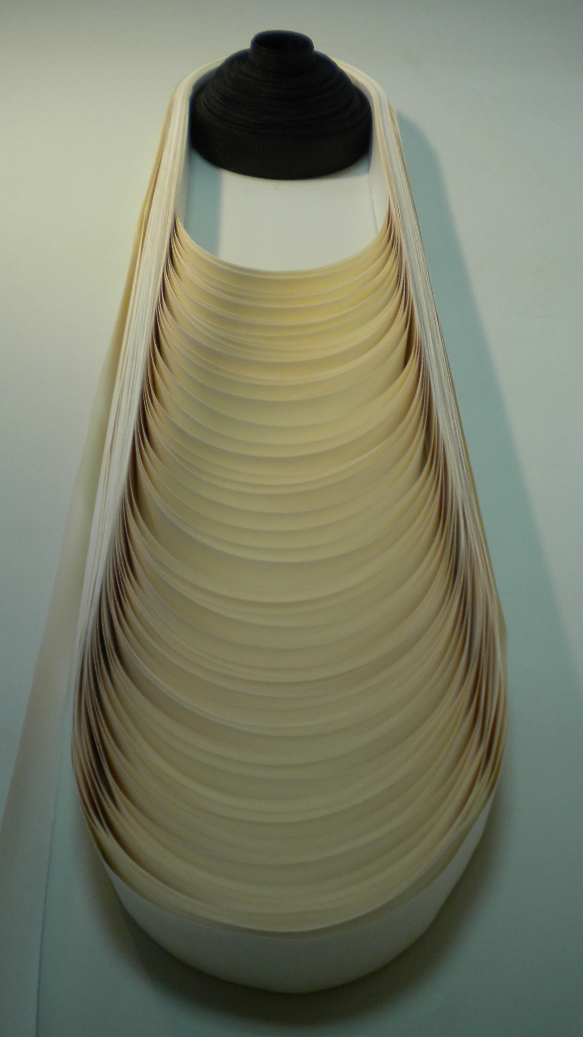 trajectory. 14”x 36”. Found appliance strap, found drywall tape.