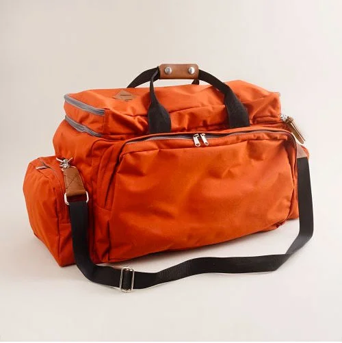 thestylebuff:

J. Crew Orange nylon weekender