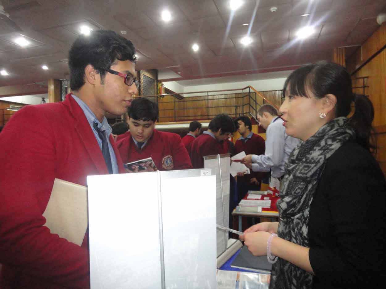 Students asking questions from university representatives