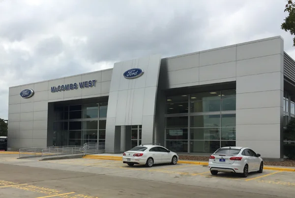 Dealers cheer Ford facilities plan The big draw: Offer to match store spending is all carrot, no stick