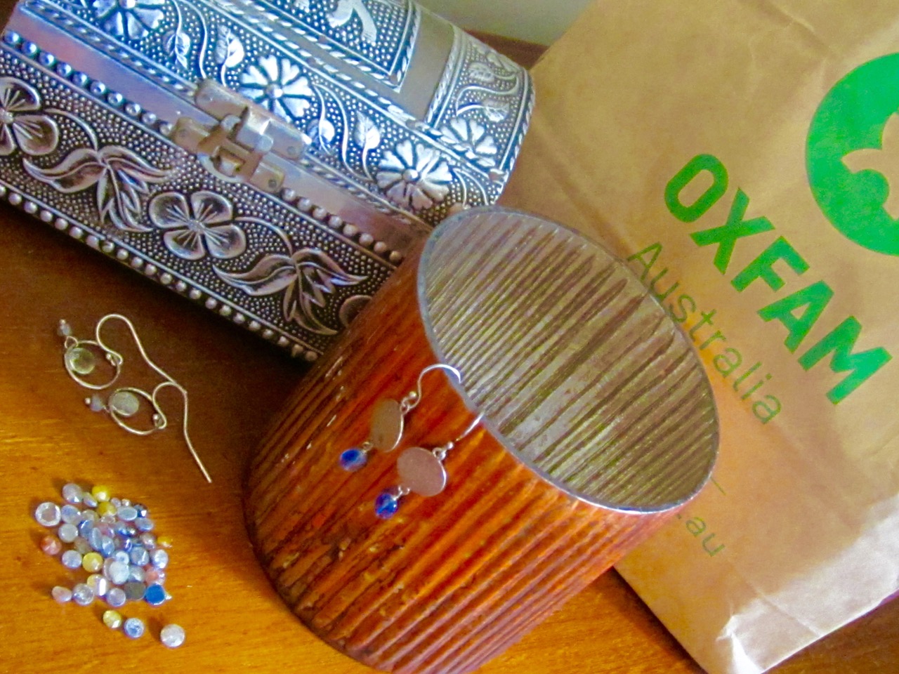 Fair trade: It's not always about you. Think of others, too! Artisan glass candle holders, handcrafted metal box from Oxfam. VIX Jewellery pieces made from ethically sourced beads and stones and recycled silver. Hand cut Indian diamonds sourced from ethical dealers.