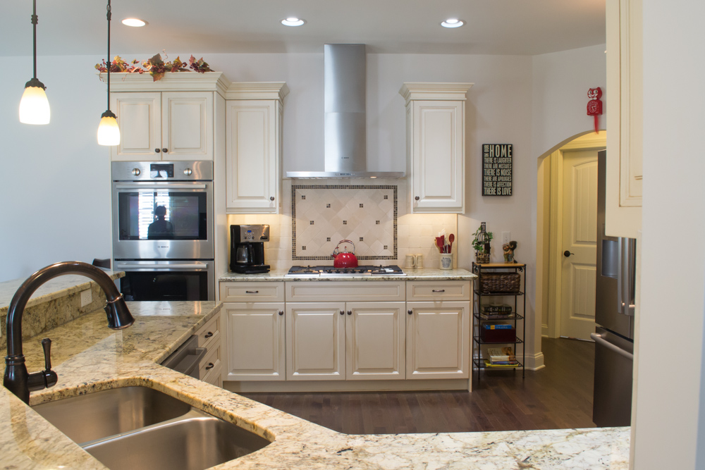 White painted custom cabinetry oyster glaze breakfast bar -7.jpg