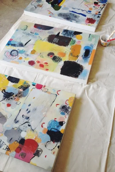 Cleaning up the edges of these canvases, prepping them for a gallery.