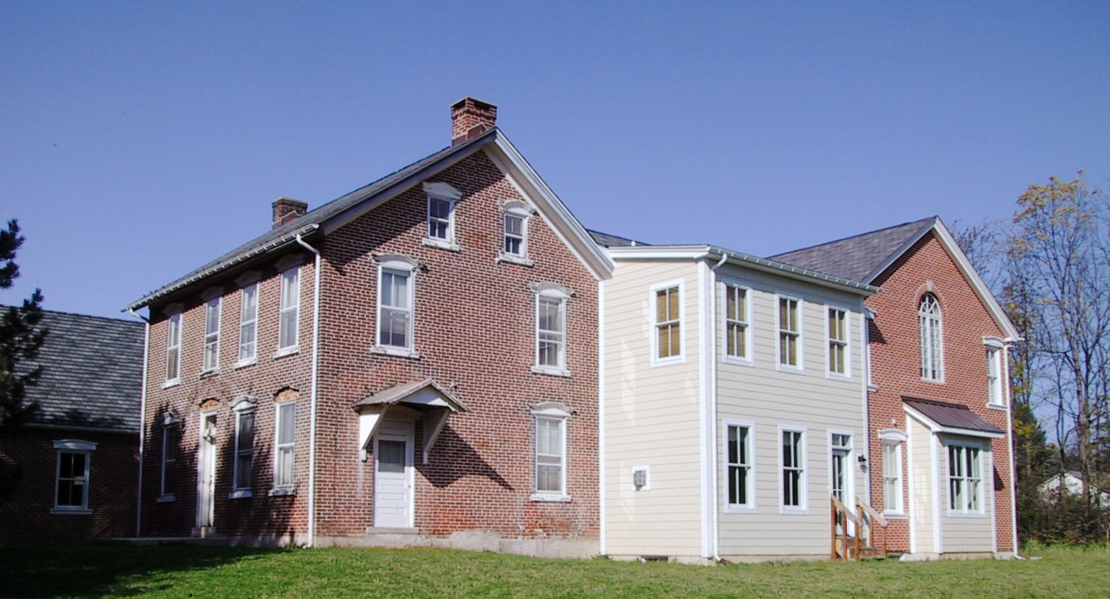 Existing Brick Farmhouse with addition to the right