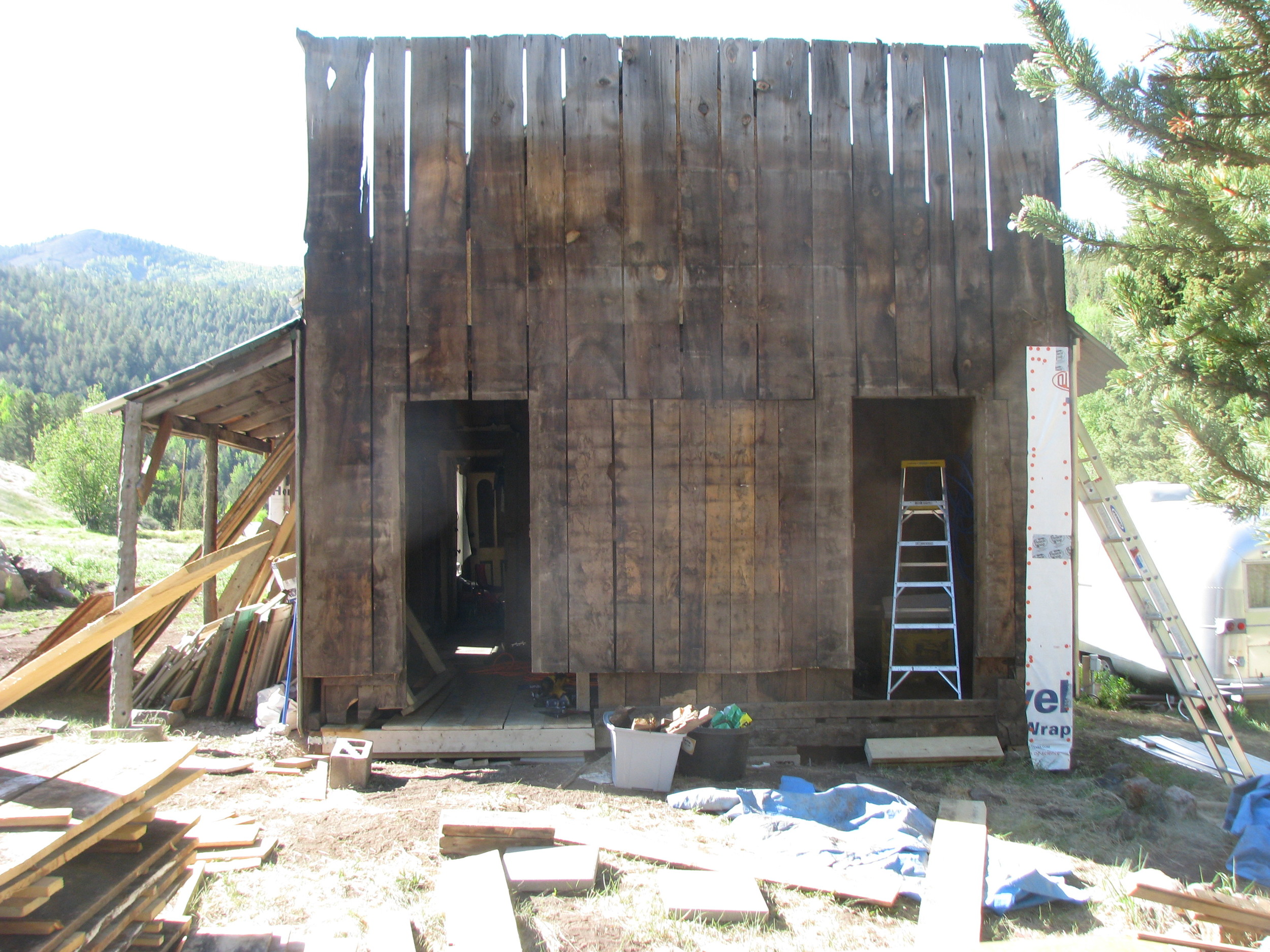  The walls had no framing, and the bottom 18 inches of the exterior boards were rotten. 