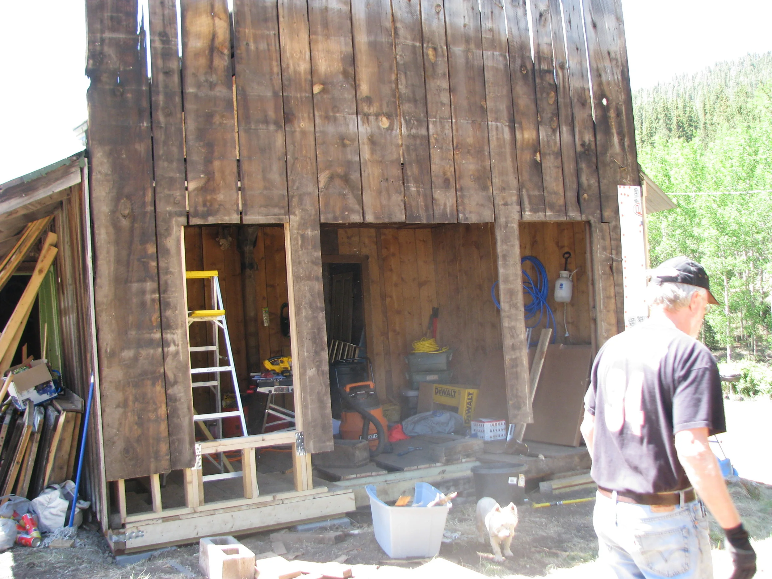  The middle section of the wall once held swinging saloon doors. The boards for this section were merely hanging there, supporting nothing.&nbsp; 