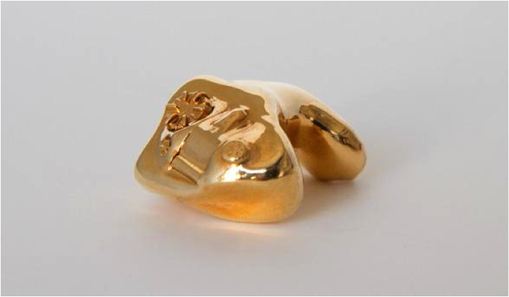 Sculpture: My Father's Hearing Aid Cast in Gold by Neil Goldberg, 2012