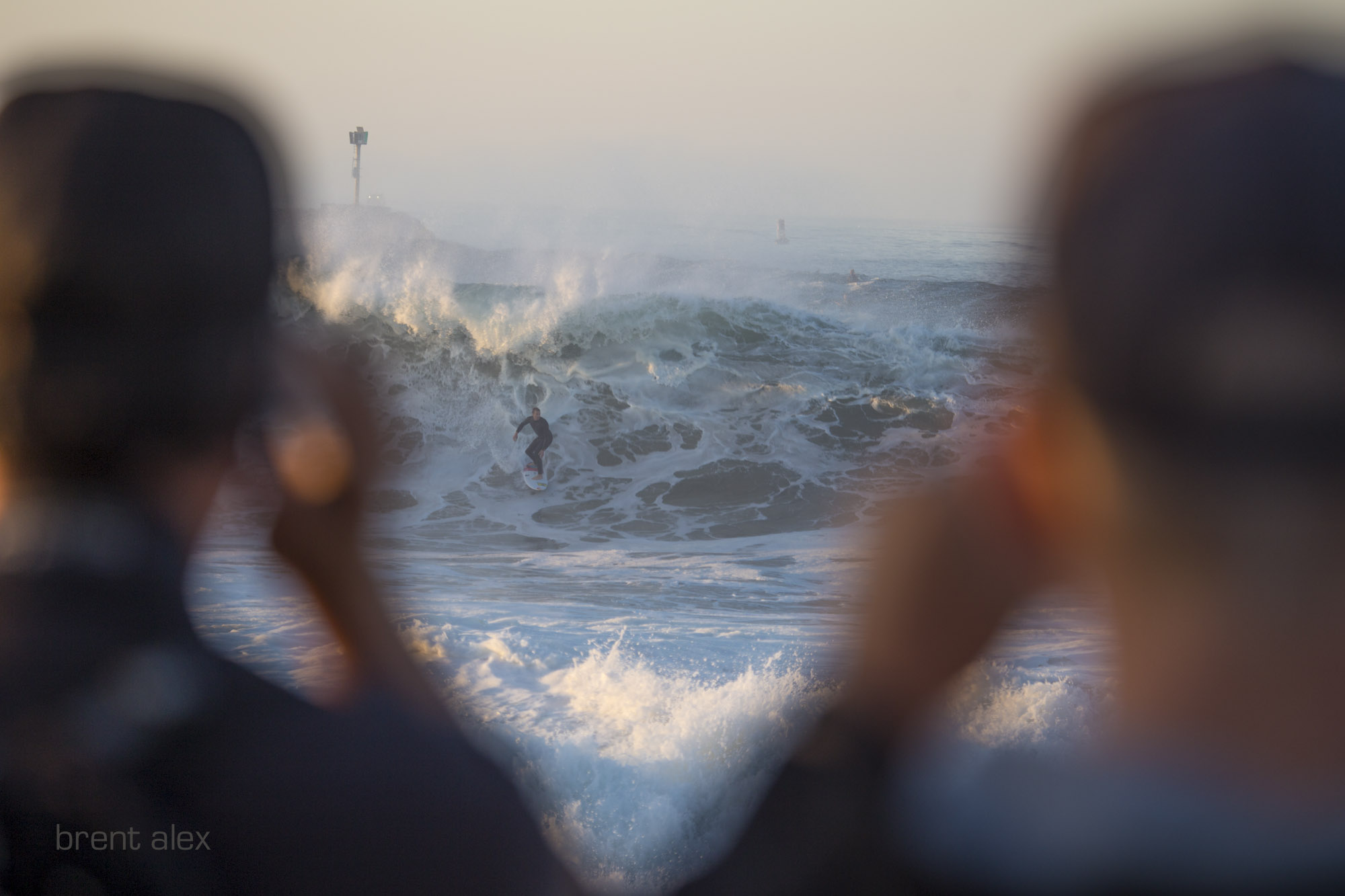 A pair of onlookers witness a big drop and harrowing escape from a foam bomb.