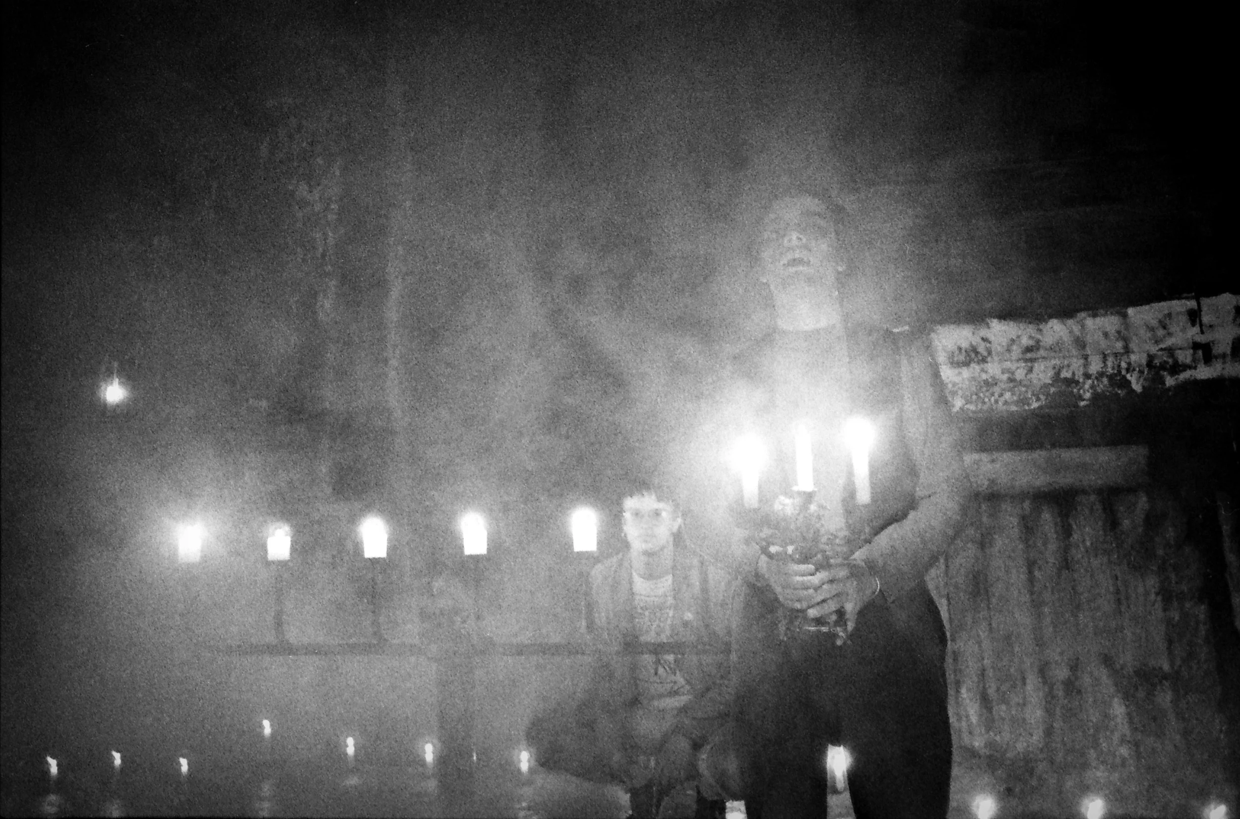 The director looks on as The Vampire strikes a pose.