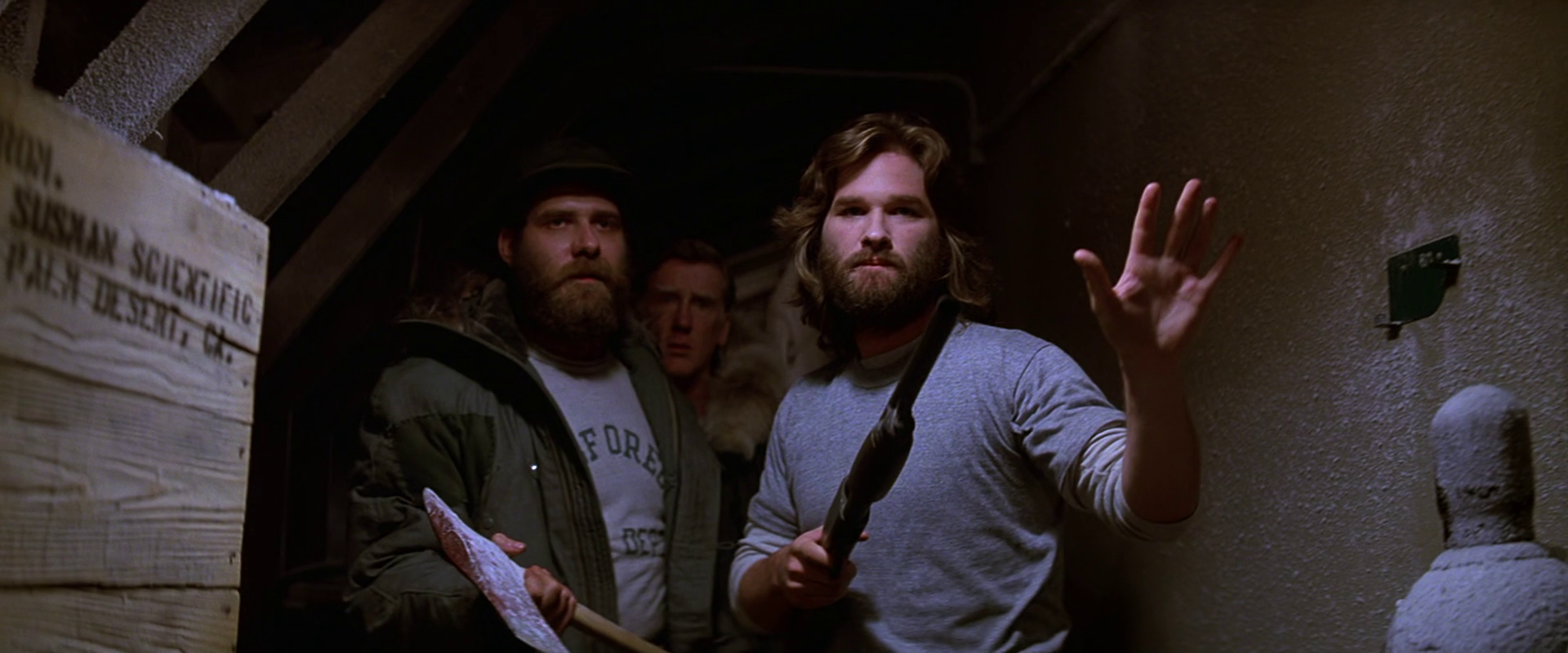 MacReady_and_Clark_approach_the_kennels_-_The_Thing_1982.png
