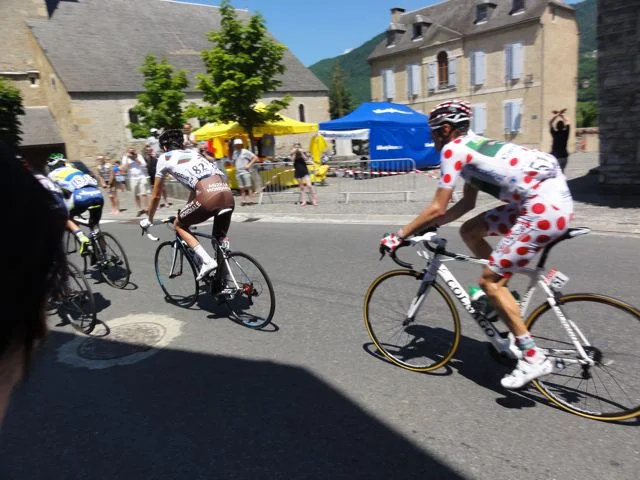 The early break of the day rolls through with Pierre Roland in the KOM jersey! (love the bike)
