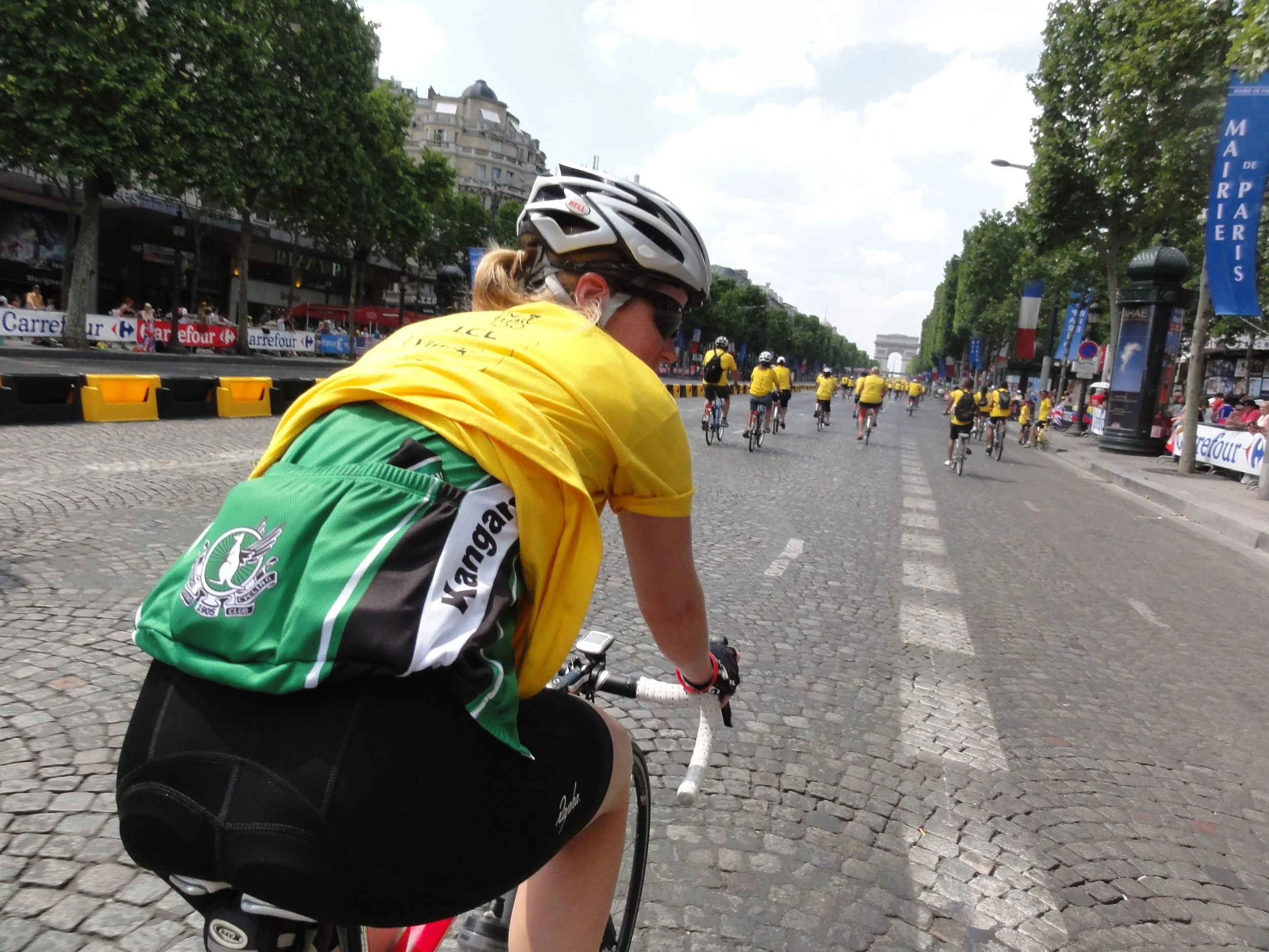 A little bit of TeamKP on the Champs-Elysees. Well done to Claire for wearing her jersey in the searing heat under her t-shirt just for this photo!