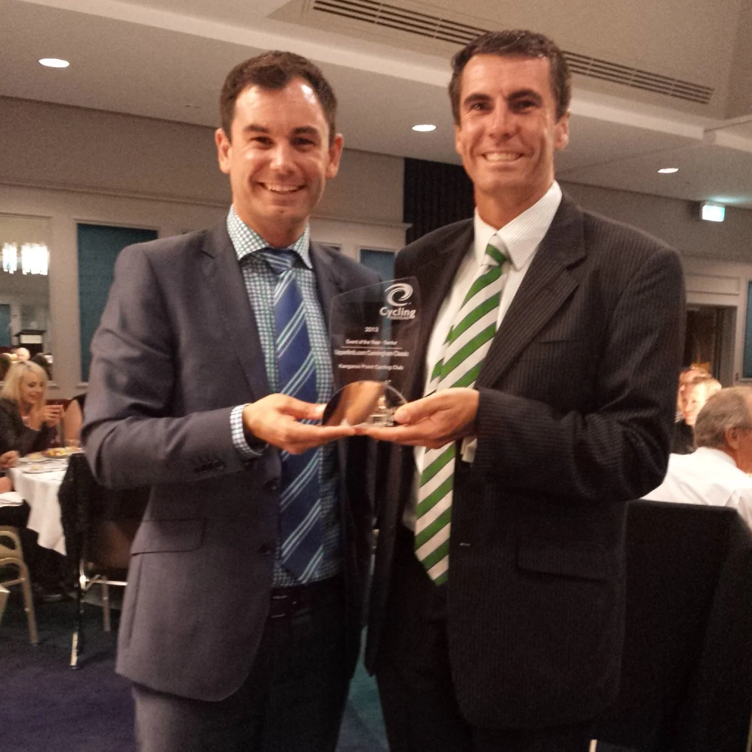 Club President Dr Aaron Urquhart and Club Captain Cameron Hemming (members of the upperlimb.com Cunningham Classic organising committee along with Betty Bathersby) with the 2013 Event of the Year award.