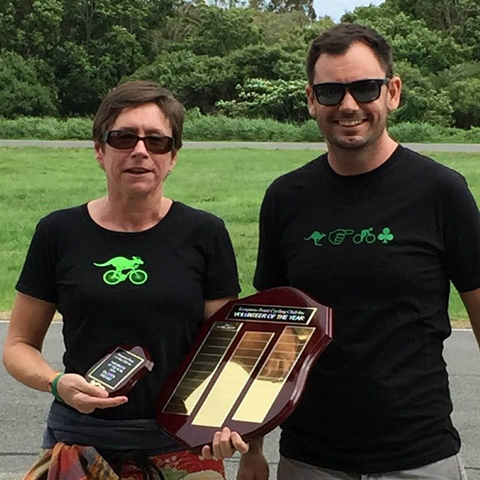 Jacinta Briant (L) receives the 2014 Club Volunteer of the Year award from Club President Cameron Hemming (R)