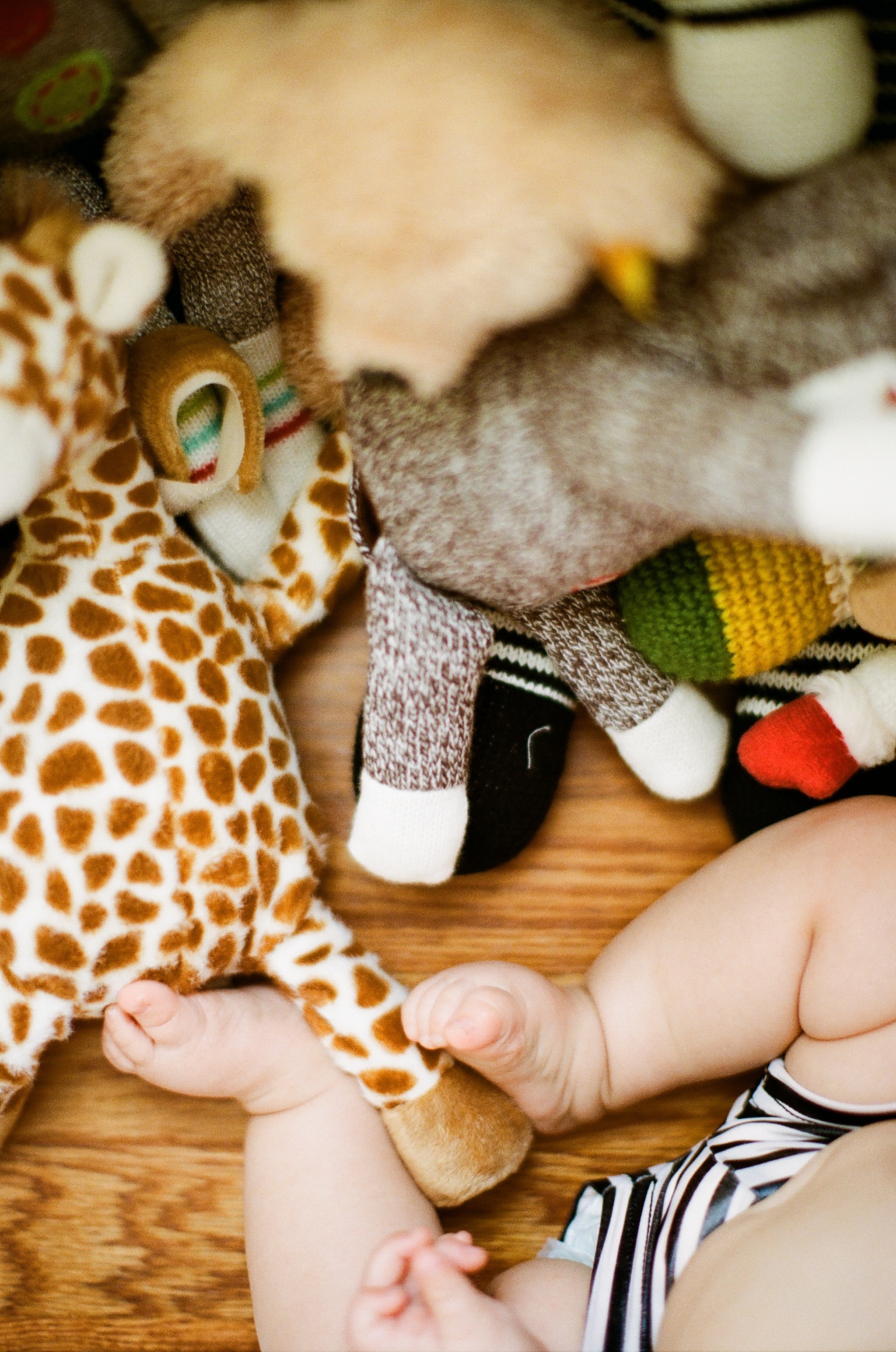Baby was playing with her toys directly under the window so there was plenty of available light. 5 Tips for Taking better pictures of your kids | Lily Glass Photography
