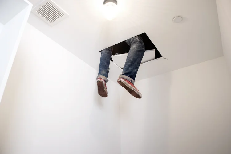 Dylan Lynch Hangin Out 2010 Artist’s clothing and dry wall Dimensions variable