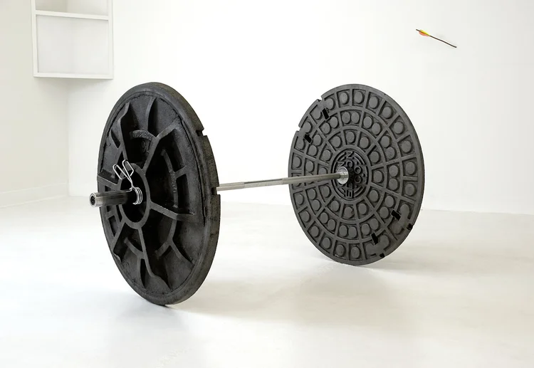 Nick Darmstaedter 600 LBS 2010 Stainless steel bar, stolen cast iron man hole covers Dimensions variable