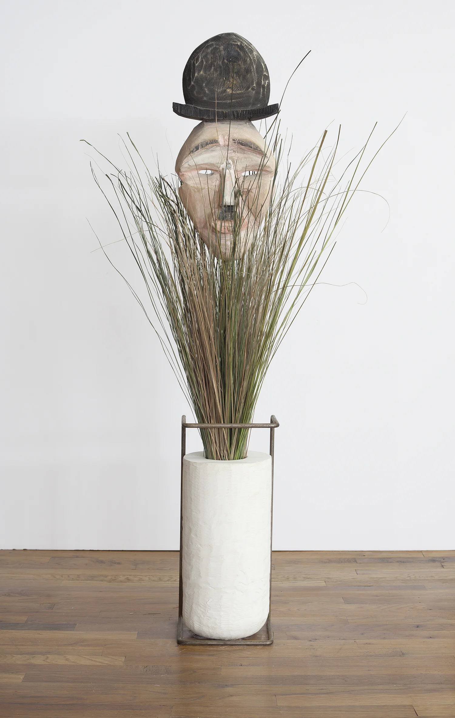 Face Off (Charlie) 2013 Wood, grass, plaster and steel Dimensions variable