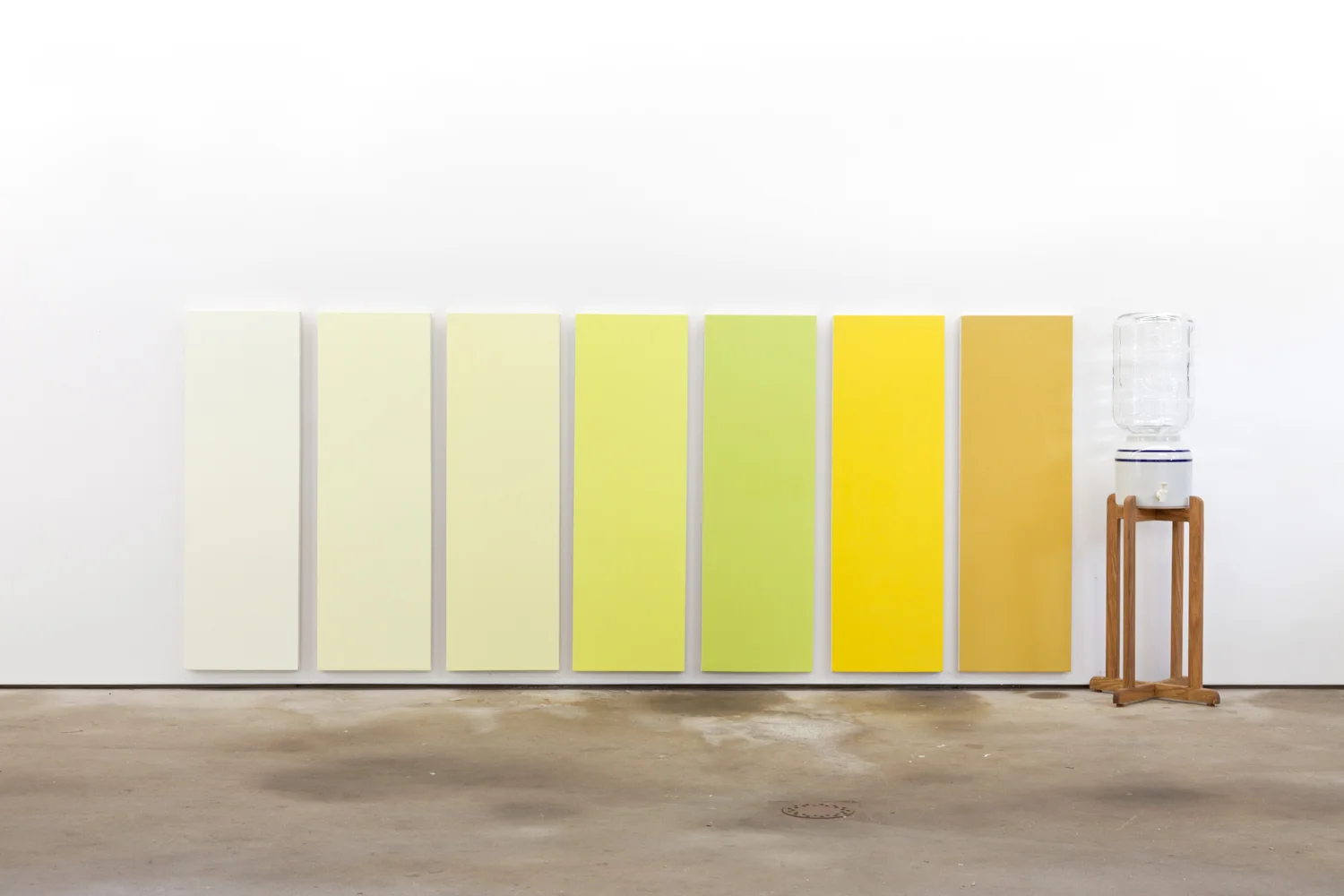 Nick Darmstaedter&nbsp; Mountain Valley Urine Color Chart&nbsp; 2013 Acrylic on canvas with wood, porcelain, glass and spring water  50 x 135.75 x 18 inches &nbsp;