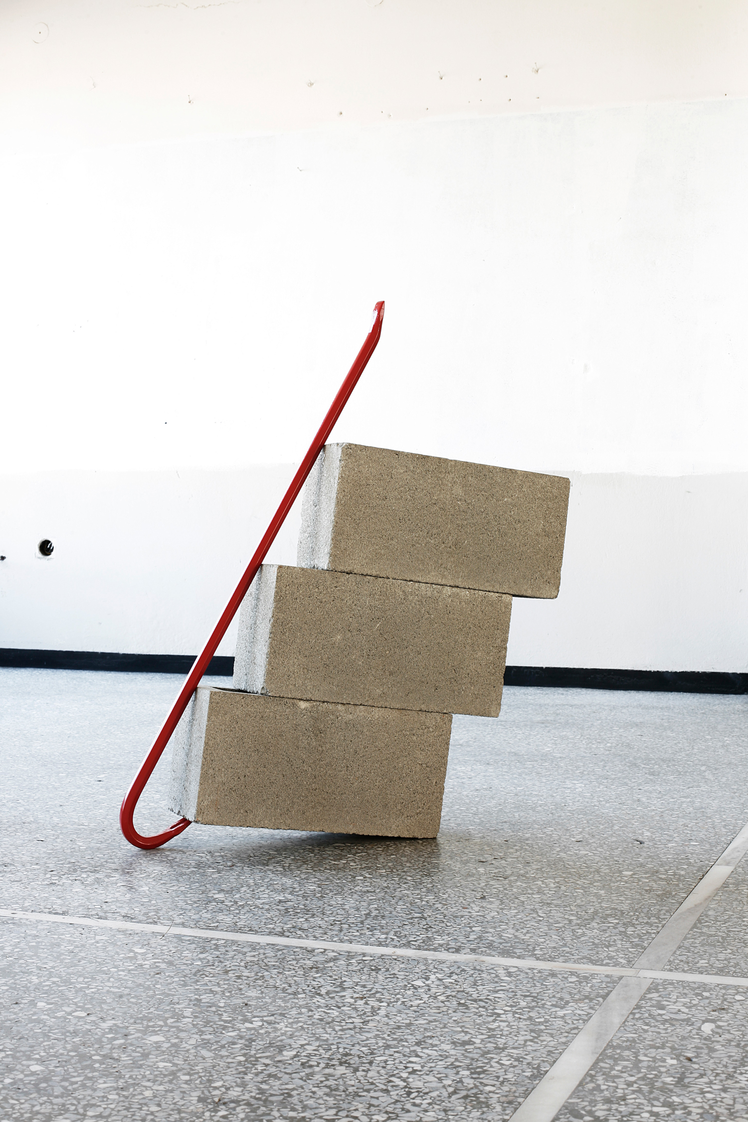 Dylan Lynch Standing Alone with Three Cinder Blocks (Red) 2013 Crowbar, cinder blocks 32 x 27 x 5.5 inches