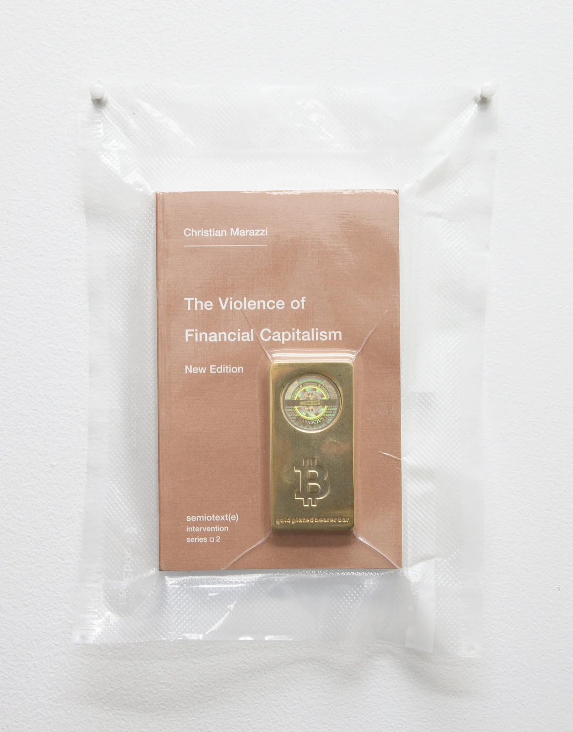 Brad Troemel TSA No Fly List Vacuum Sealed Christian Marazzi -‘the VIOLENCE of financial capitalism’ with 100 BITCOIN gold plated bar , 2013 10 x 8 inches 