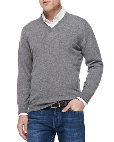 The basics: If you're not comfortable in a suit and don't want to pair a blazer with jeans, simple V-neck sweaters are great layers to dress up a shirt.
