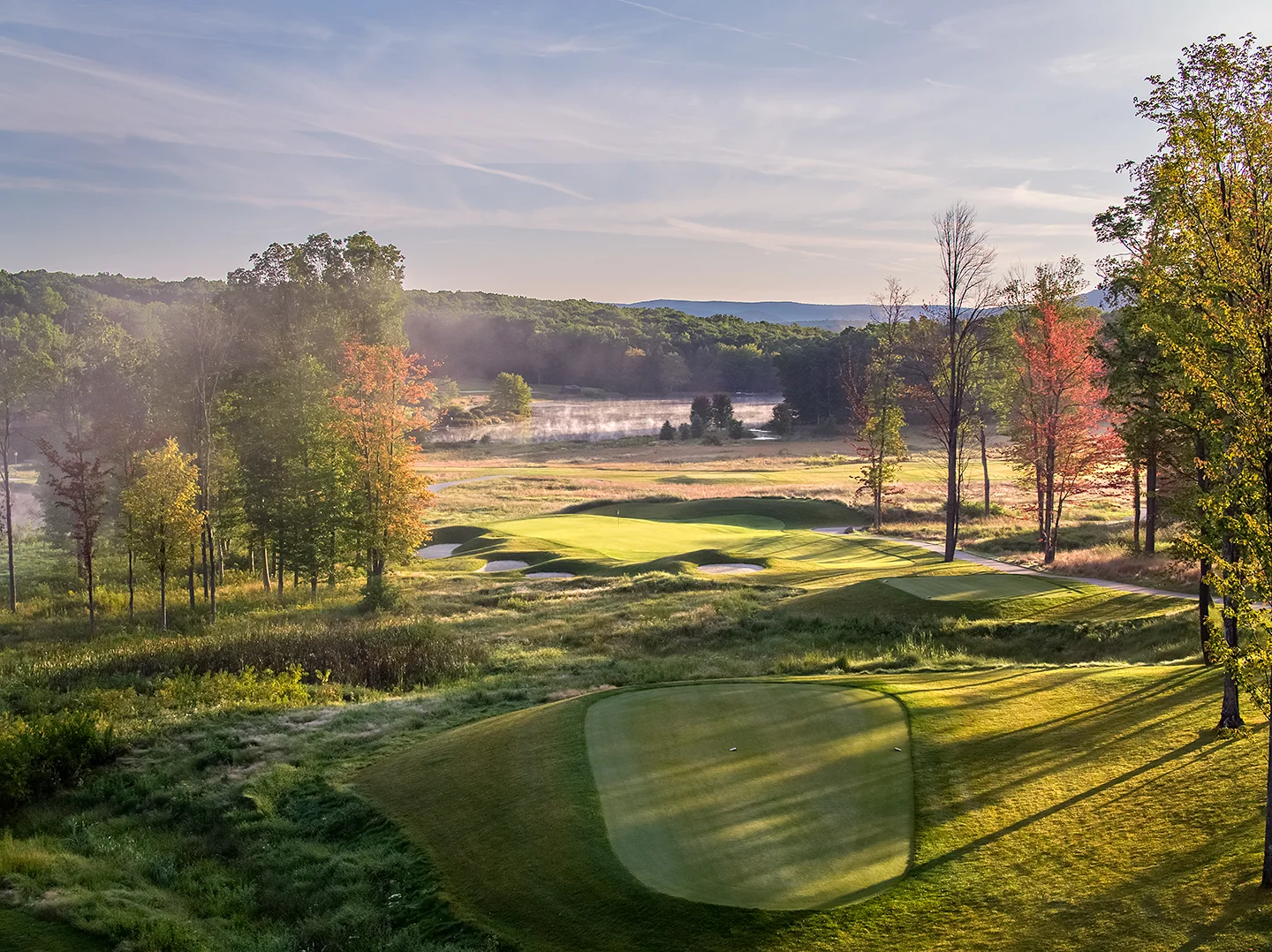 Shepard's Rock is a new 18 hole golf course opened last year at Nemacolin Woodlands Resort. Located atop the Allegheny Mountains, this is the par 3, 165 yard 12th golf hole. Tim Liddy was co-designer with Pete Dye. Photo by Evan Schiller / www.golfshots.com