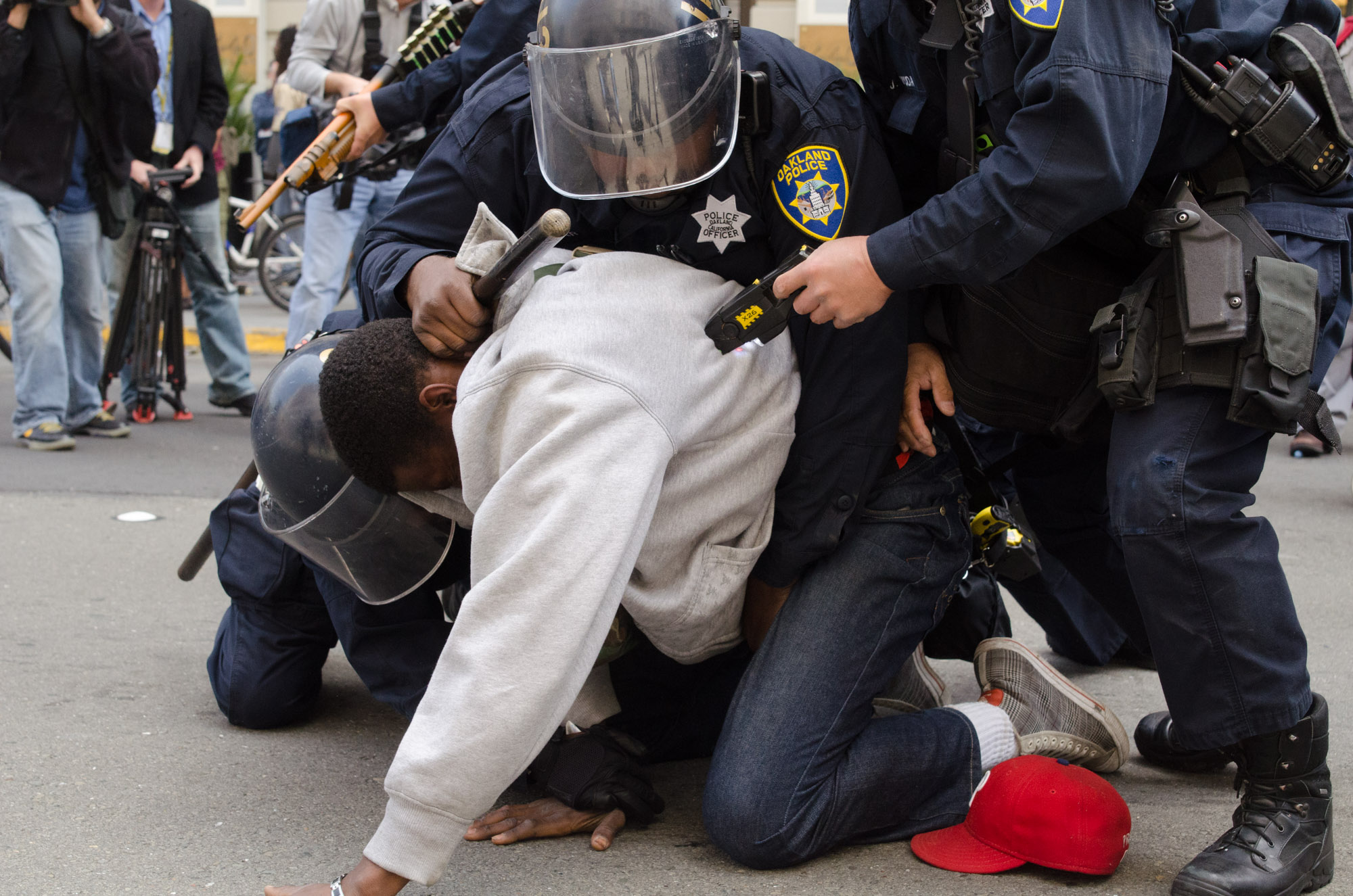 Officers Use a Taser on a Protester During an Arrest