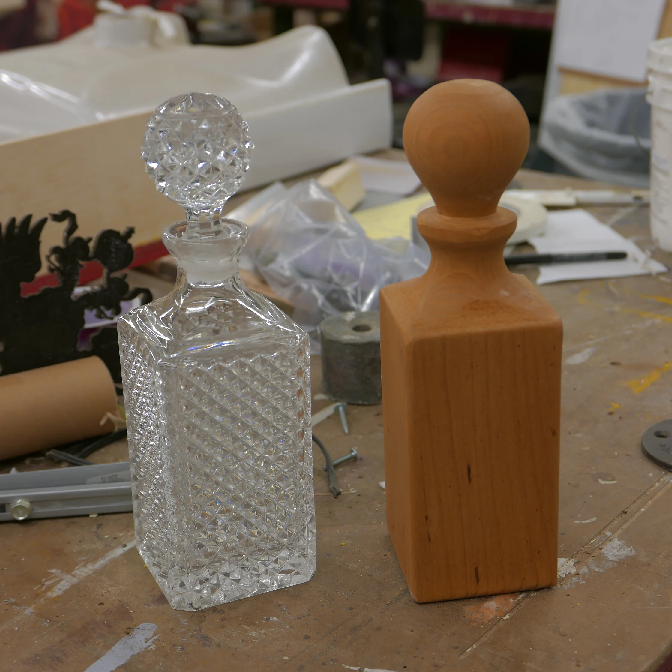 a lathe-turned, wood rehearsal bottle and the real thing.JPG