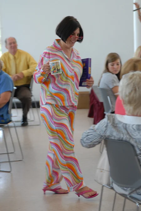 Ross Learning Center Program Director Lynn Moore shows off cozy sleepwear from Bliss.