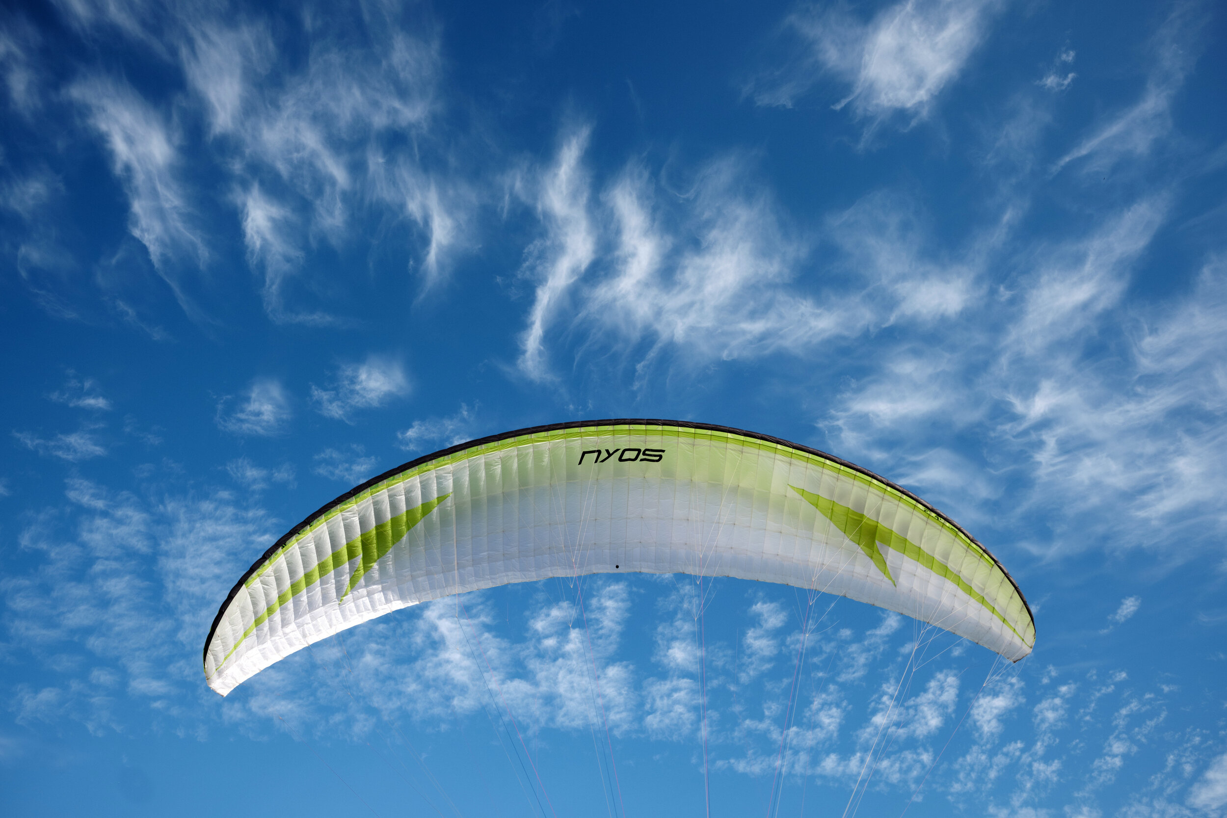 A kite surfer sail hangs over Vanier Park in Kitsilano, Vancouver