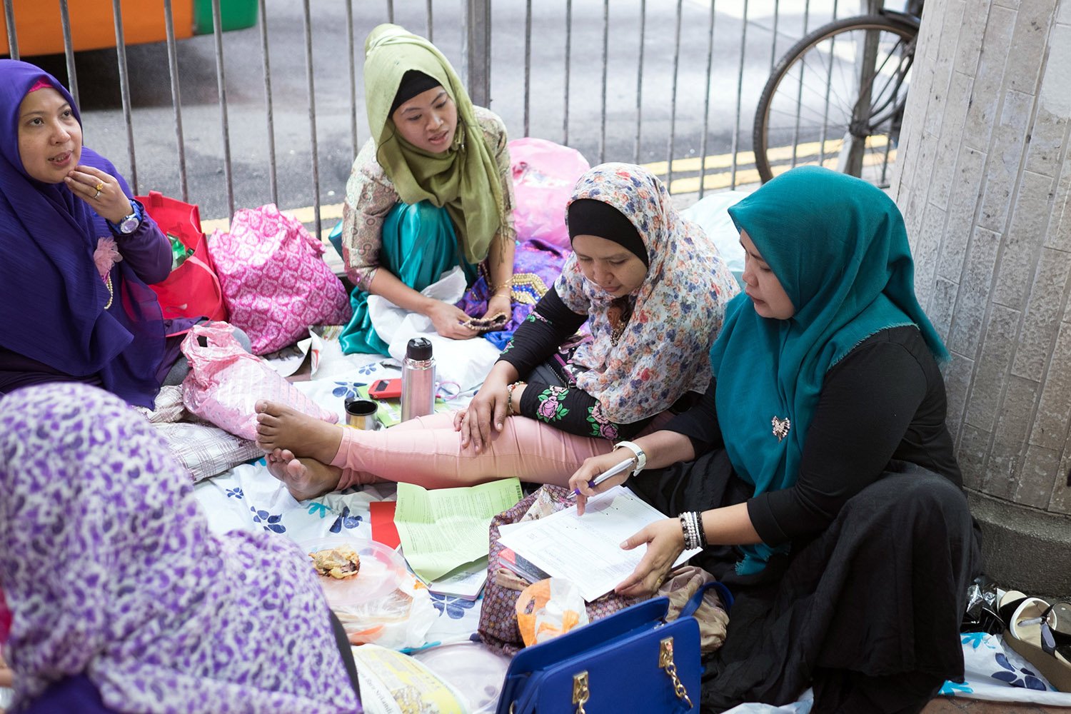 Hong Kong maids gather on Sundays on their day off