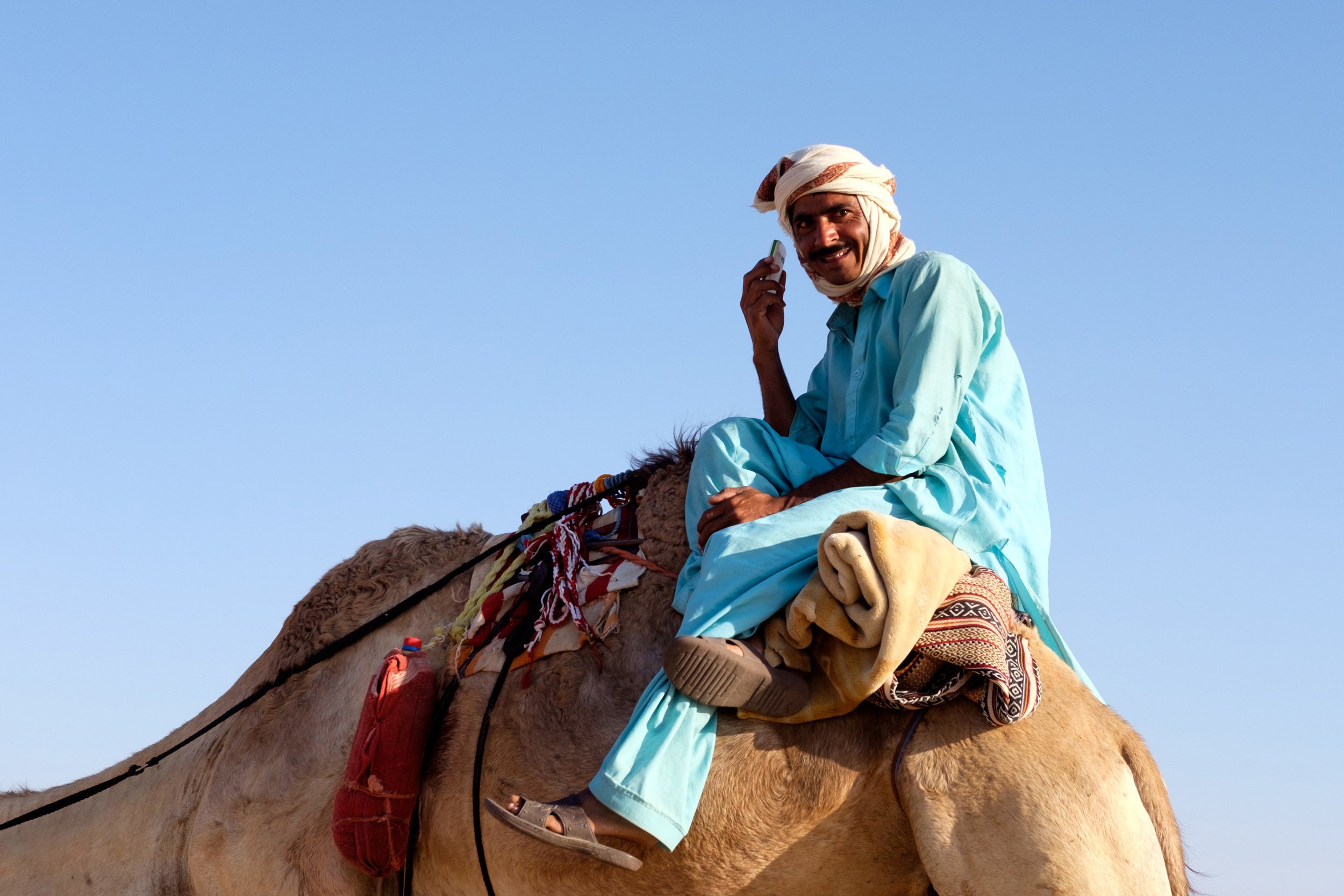 A well connected beduin with his mobile phone