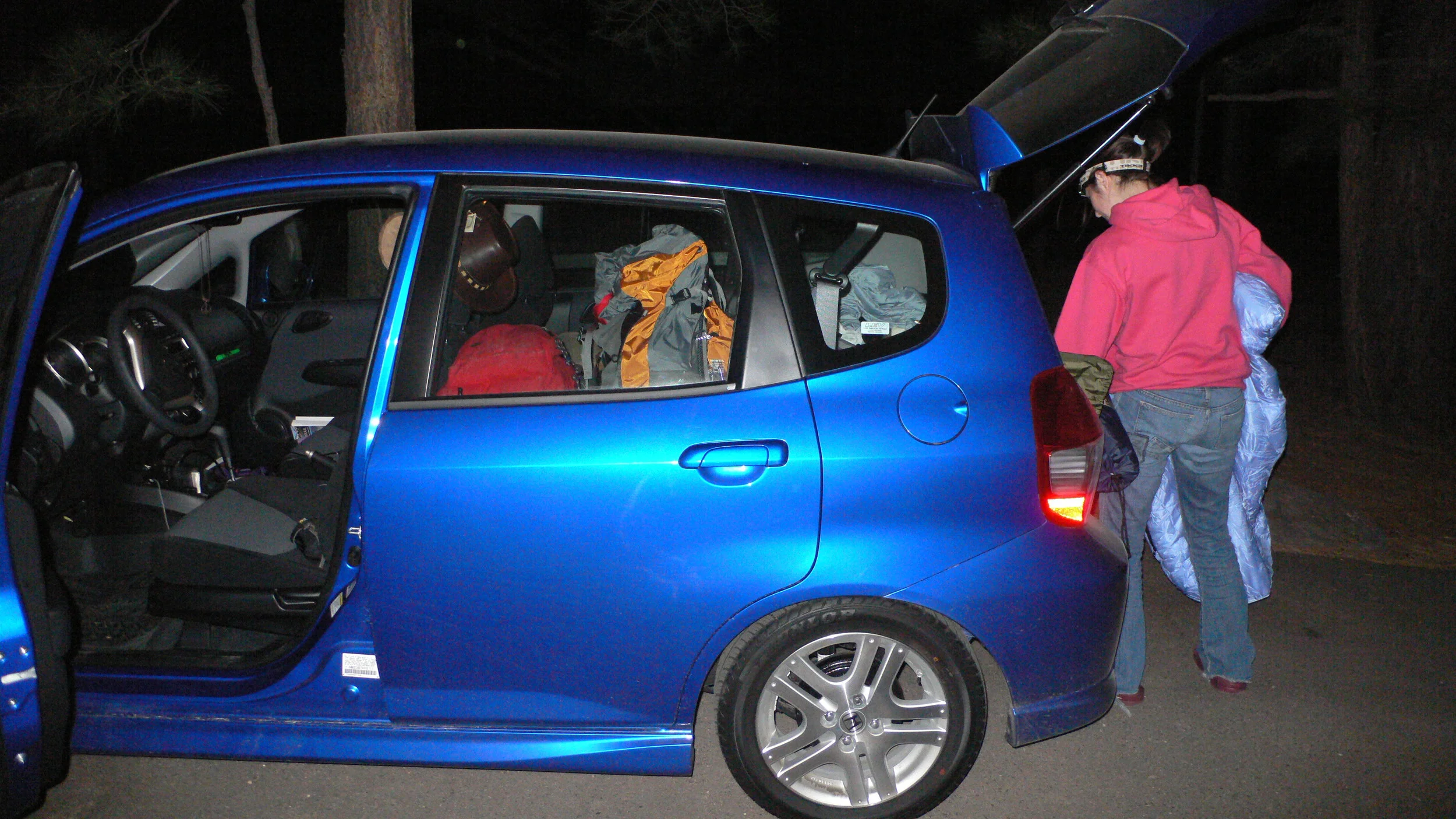 (Car being jammed full of stuff, 2008)