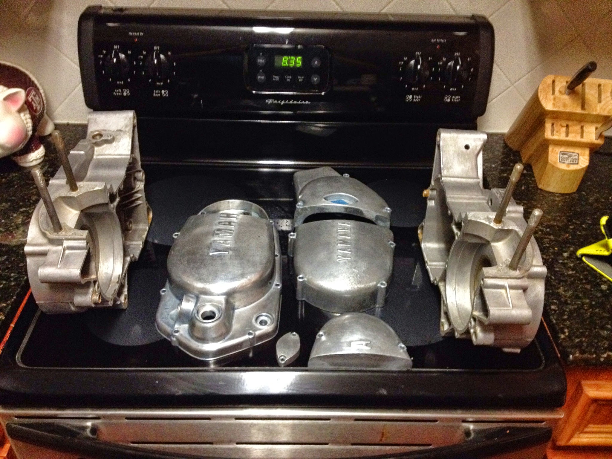 Engine cases themselves were scraped clean with a razor blade where needed, then scrubbed with a scotchbrite pad, then washed with simplegreen and #2 steel wool. Side cases were stripped with Dekote, rinsed in acetone, scrubbed with simplegreen and #2 steel wool. 