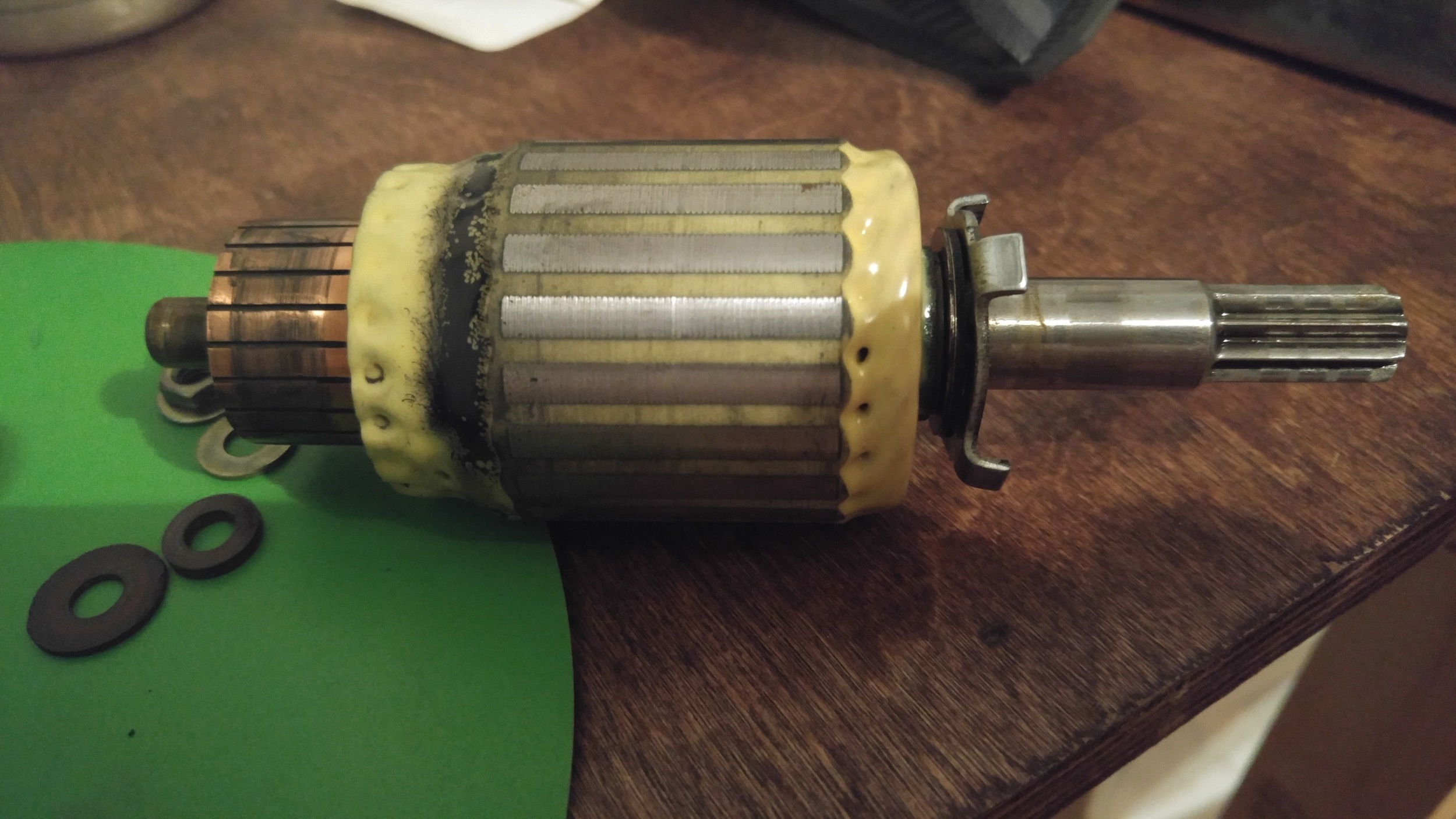 this is the actual motor. Brushes ride on the left hand copper area. Insulated washers, metal washers, and a 10mm nut also pictured