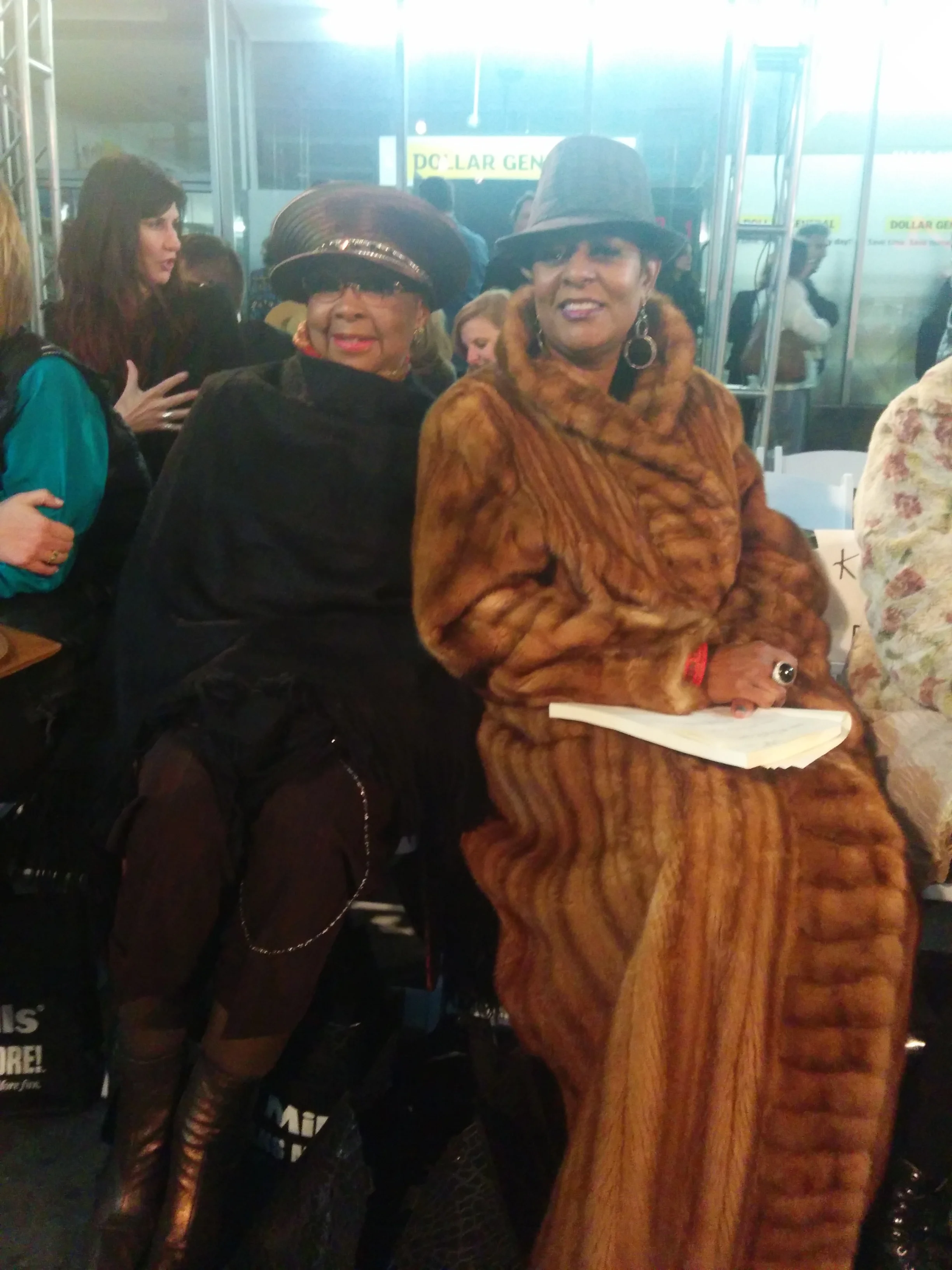                Fashionable show attendees.  Those furs were more than necessary that night because it was very cold that night.