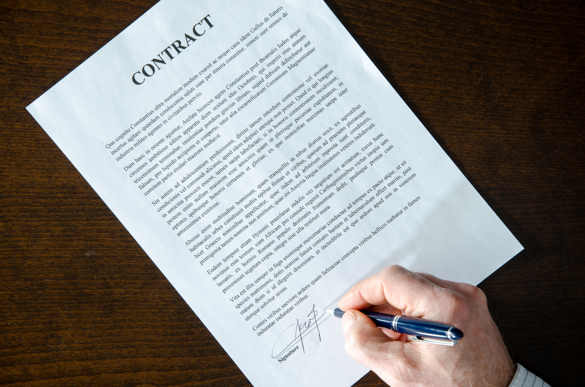 046327647-contract-signature.jpeg