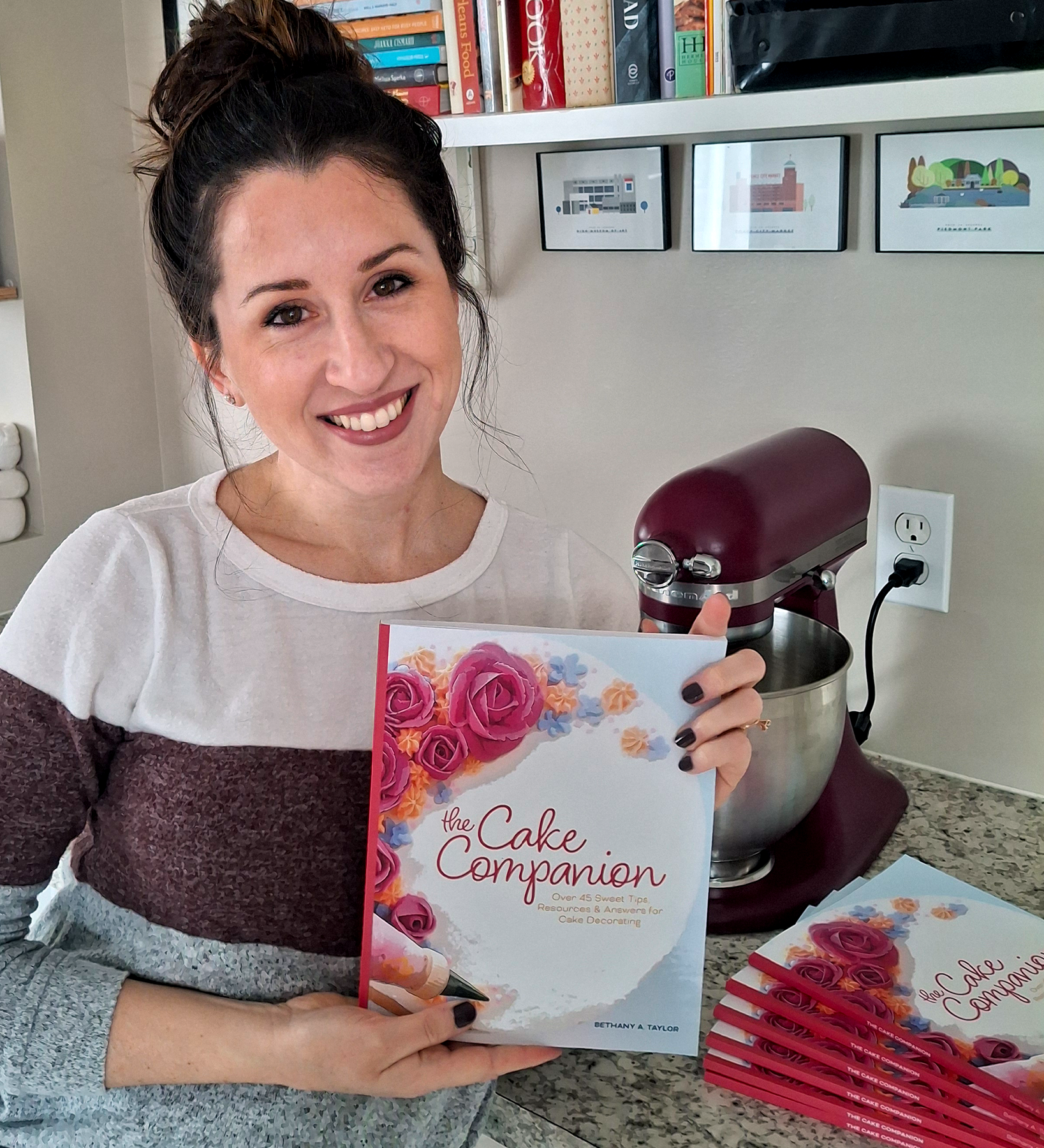 Bethany Taylor with "The Cake Companion" book
