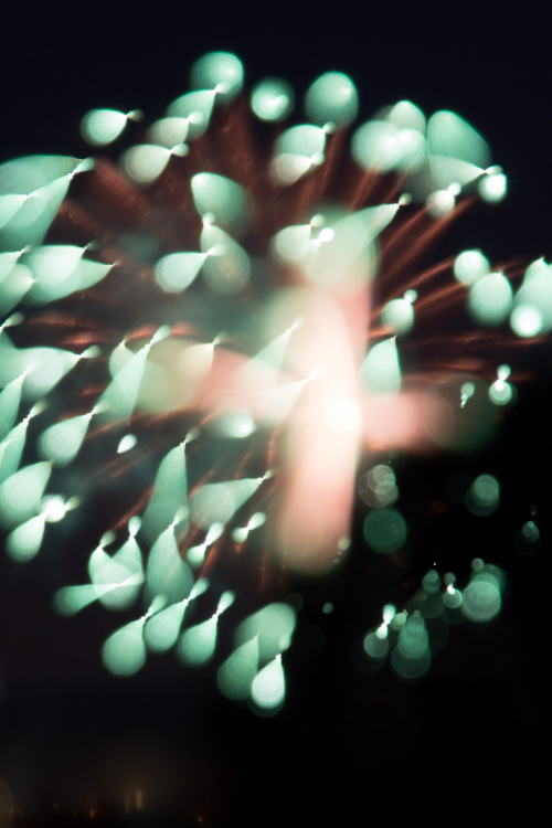 Long exposure with focus adjusted while shutter is open. - Green bow ties