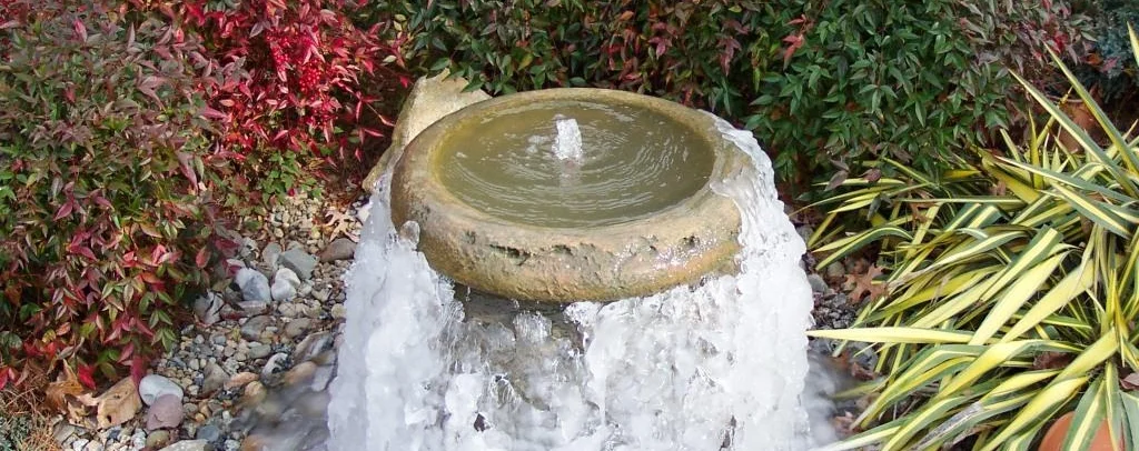 Concrete fountain in winter