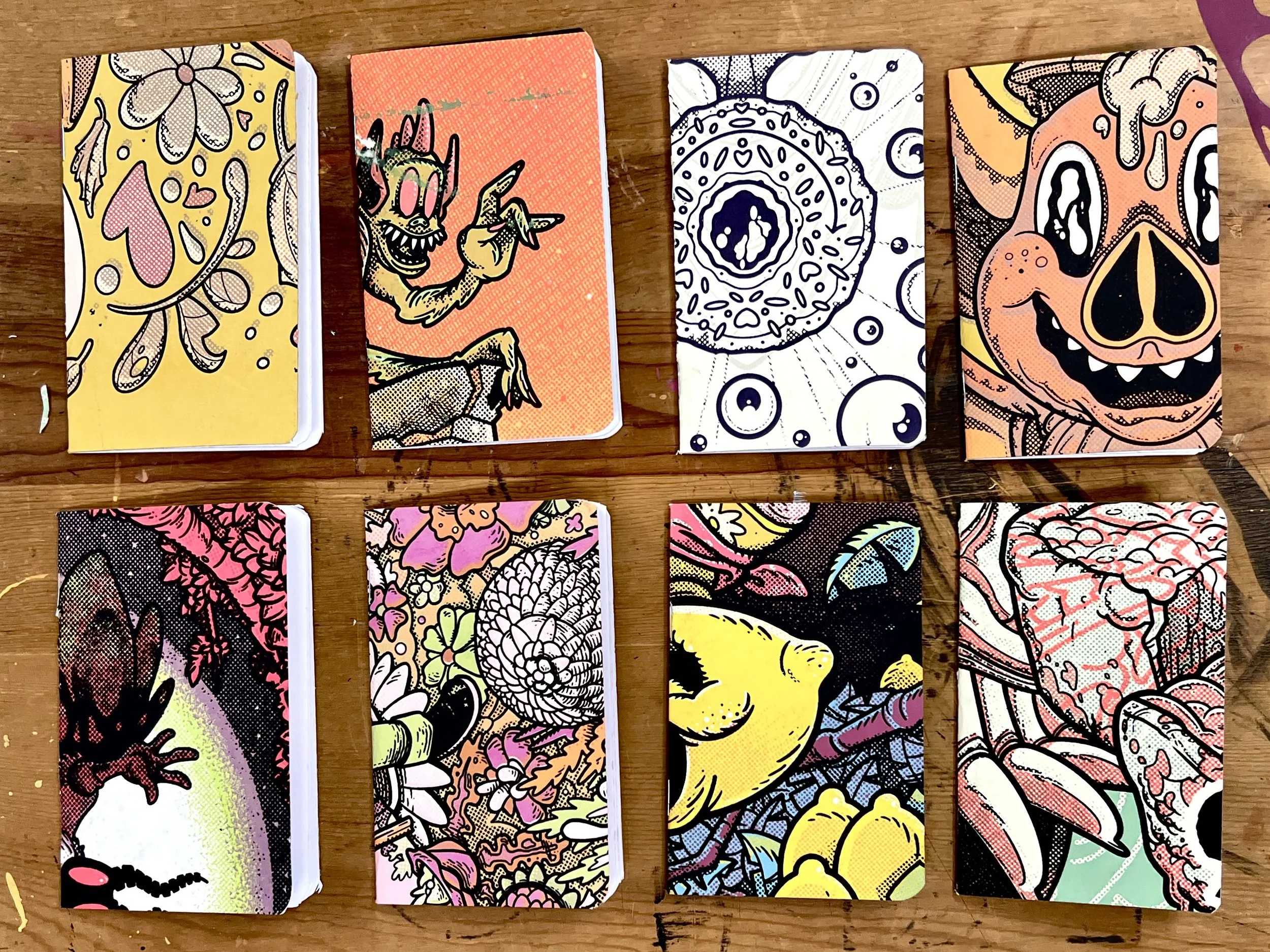 SET OF FOUR POCKET NOTEBOOKS