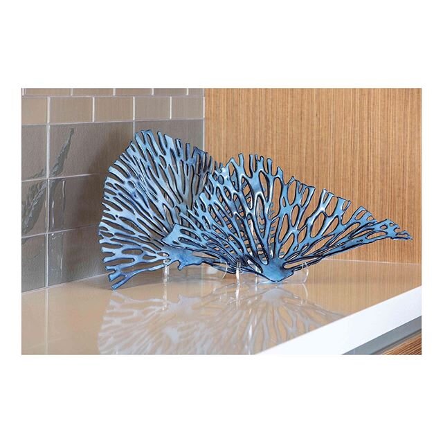 The finishing details are so important to making any space feel warm, inviting, and lived in. These glass sea fans by @rondierdesign added just the right finishing touch for the kitchen in our Laguna beach bungalow! Swipe to see how it looks in the k