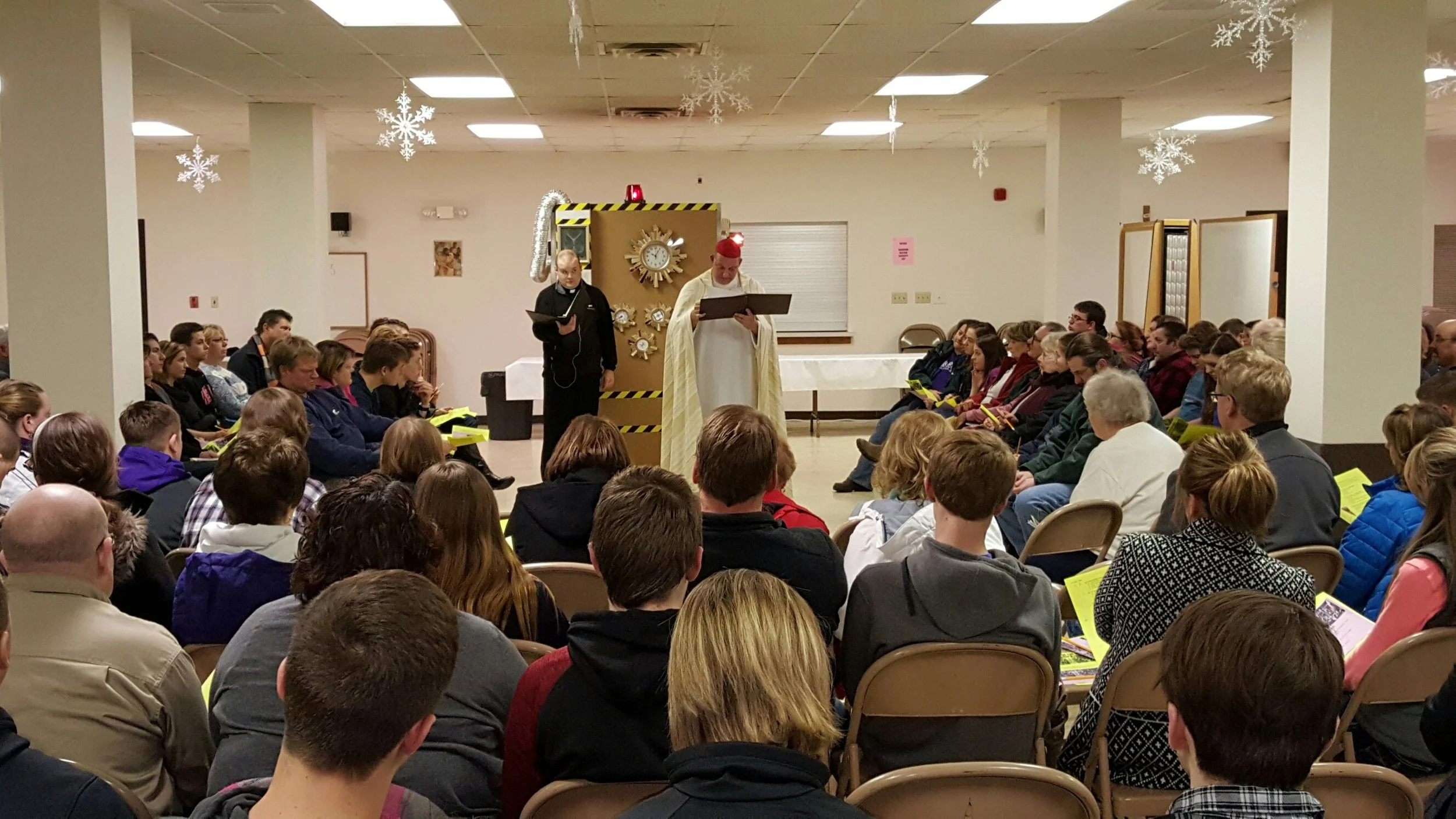 With the "Time machine", Fr. Jamie & Fr. Brian taught about the history of the mass to students and their parents.