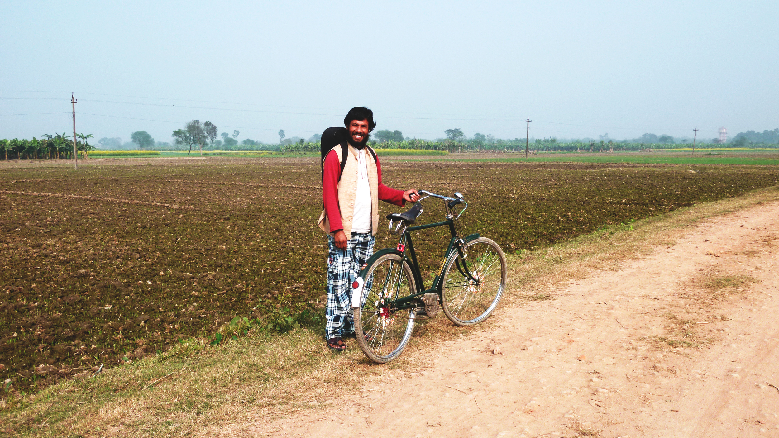  Noor Alam and his bike, a visit to a friend, December 2011&nbsp;© Edith 