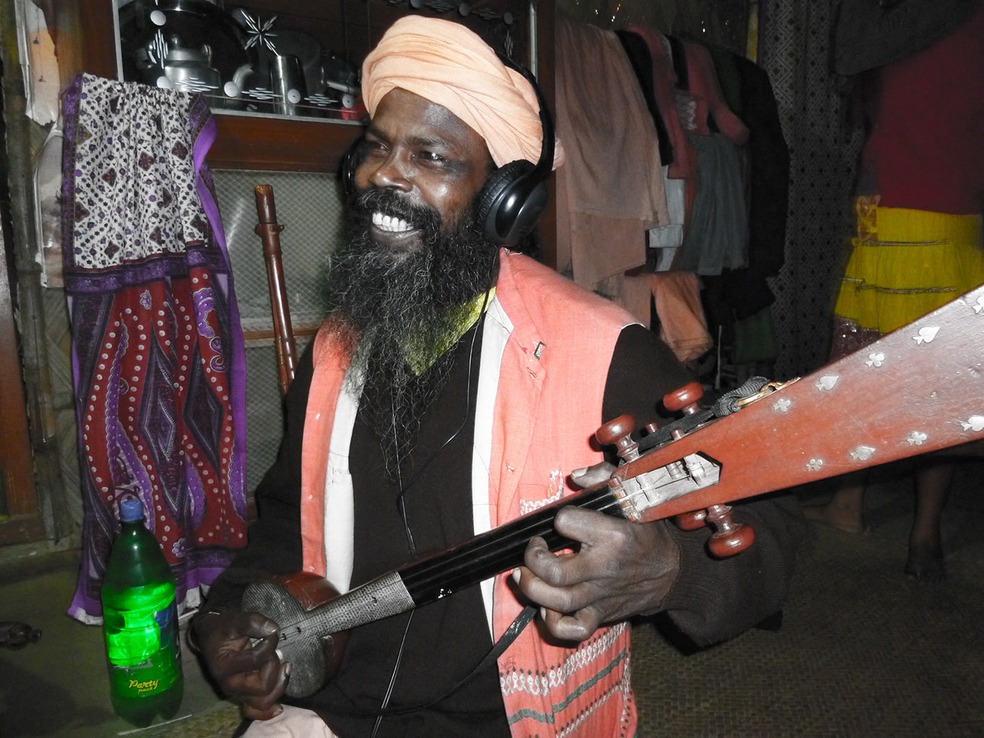  Arjun Khyapa at home listening to himself after a recording&nbsp;© Edith 