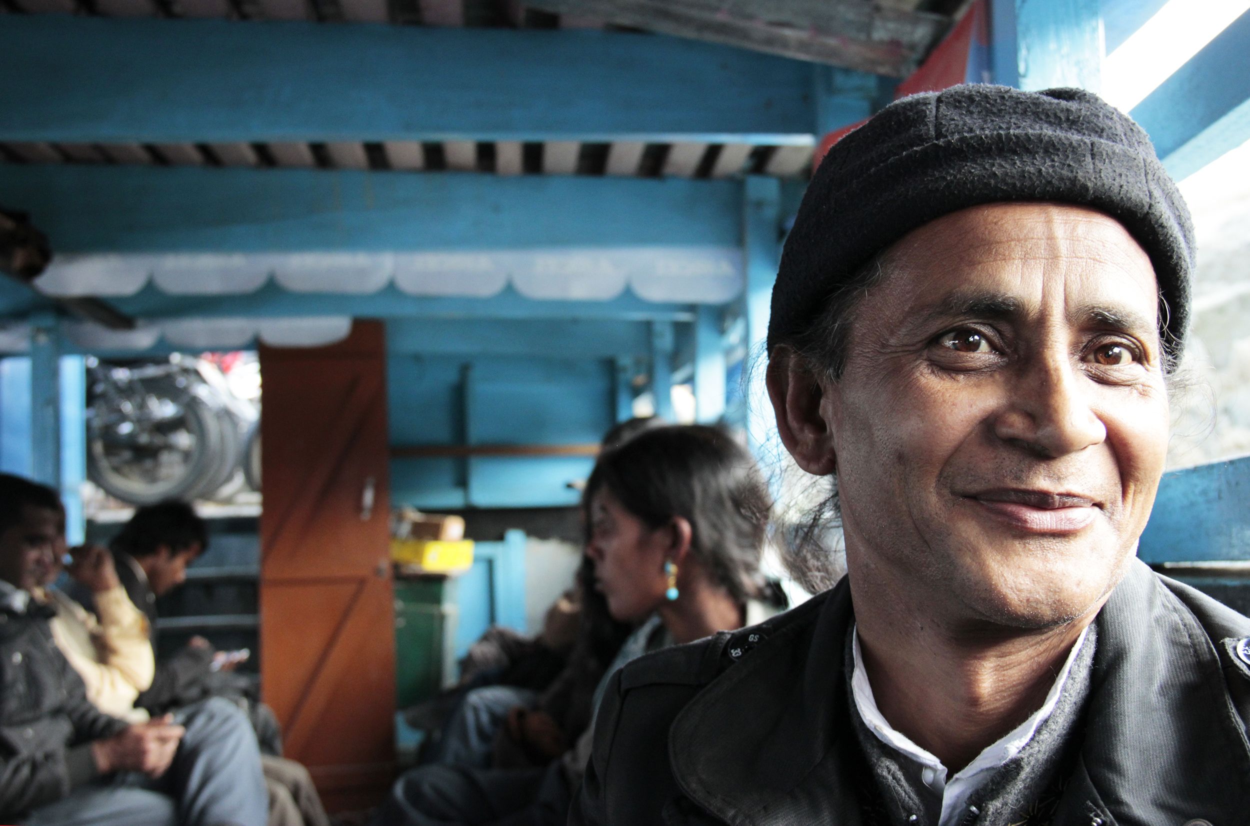  Govinda in the boat from Jorhat to Majuli, January 2014 © Edith Nicol 