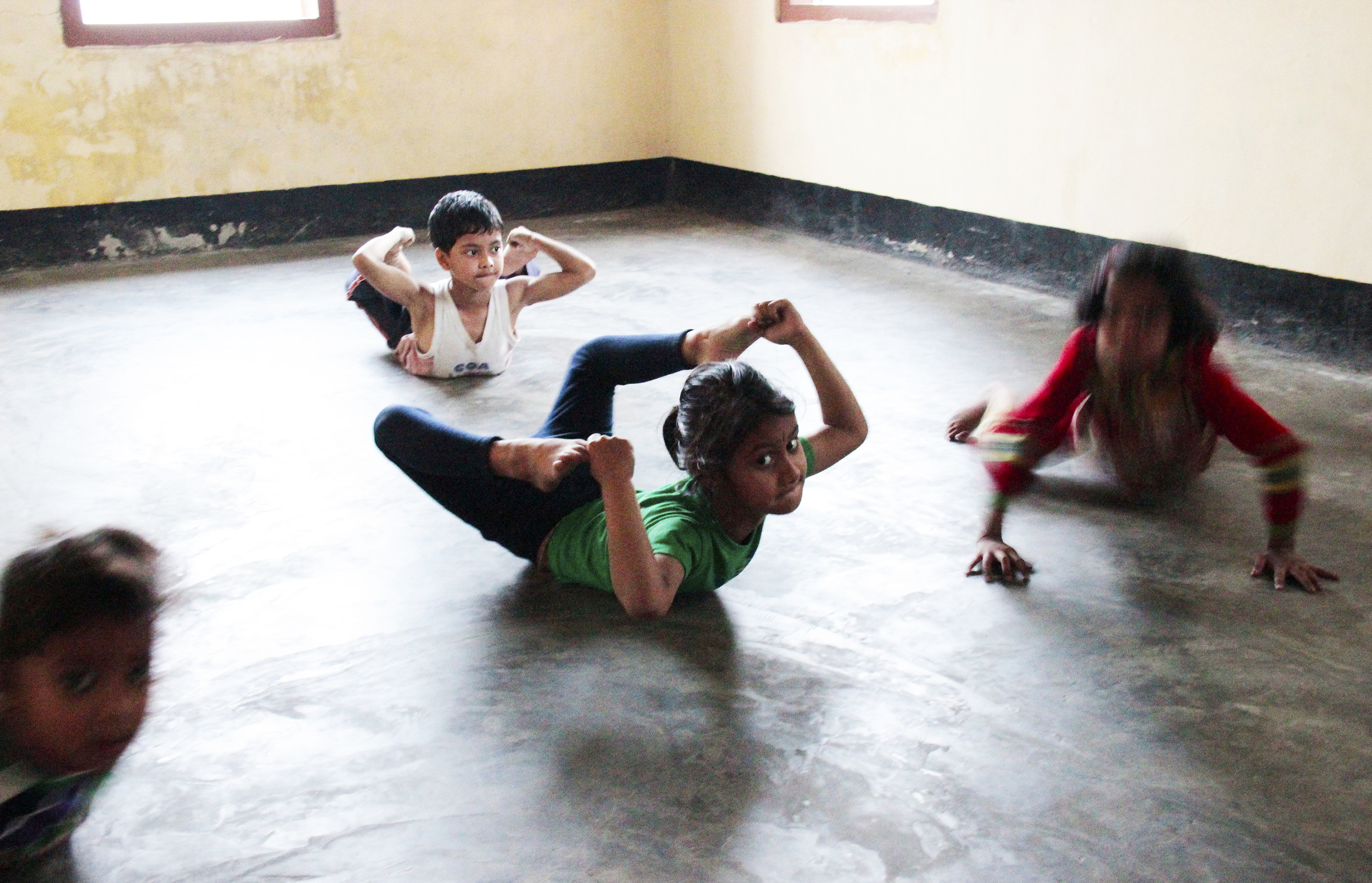  Children during their sattriya dance class, under the eyes of 'Guruji' Govinda, Majuli Island, January 2014 © Edith Nicol&nbsp; 